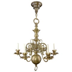 1890s Williamsburg Style Brass Chandelier with Dolphin Details