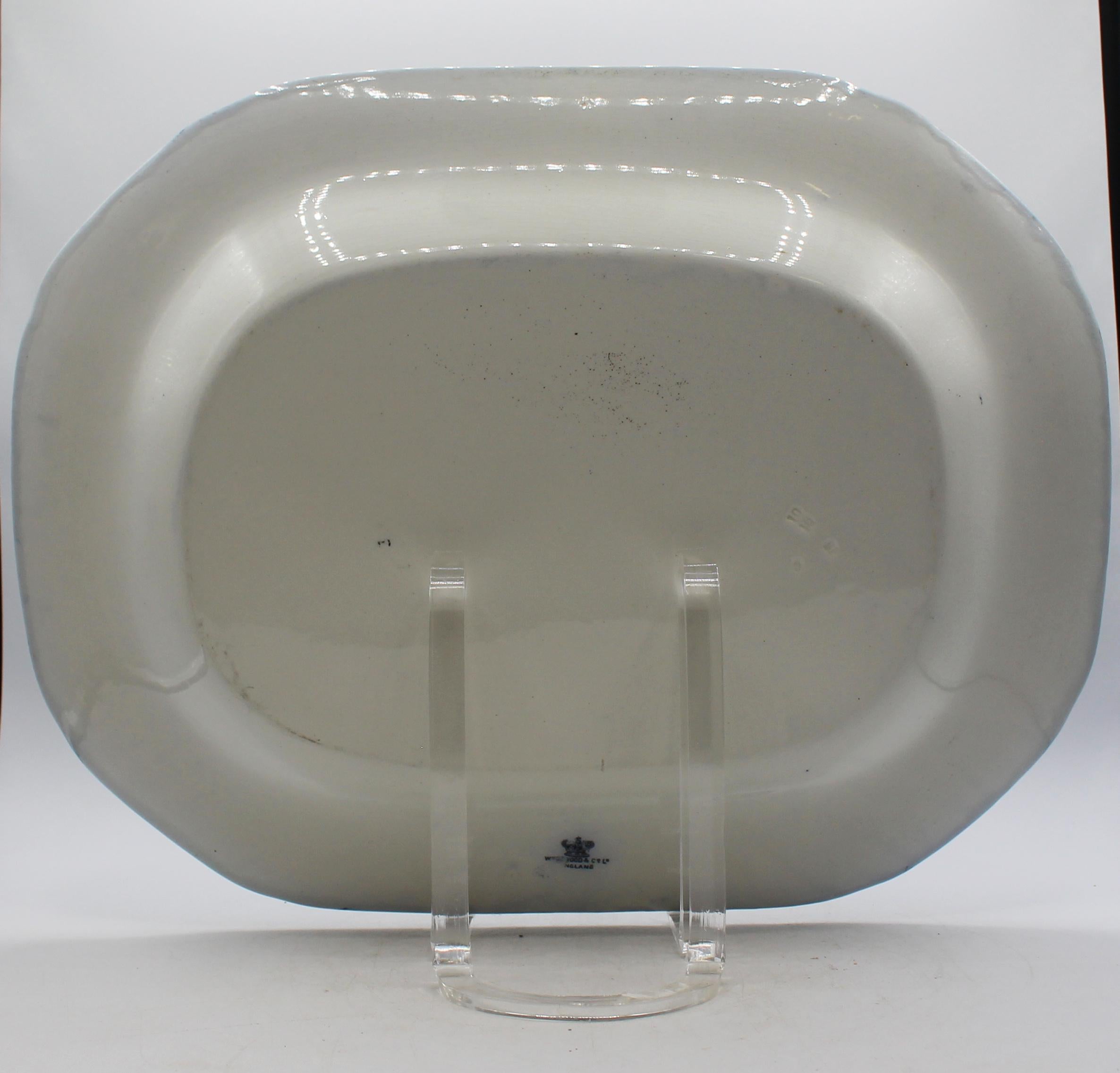 1891-1911 Wedgwood Cows flow blue pattern platter, English. Ironstone, 1891-1911 mark. A fine example of this beloved design. Central reserve of the cows in a pool of water with village in the background surrounded by 4 similar motif reserves with