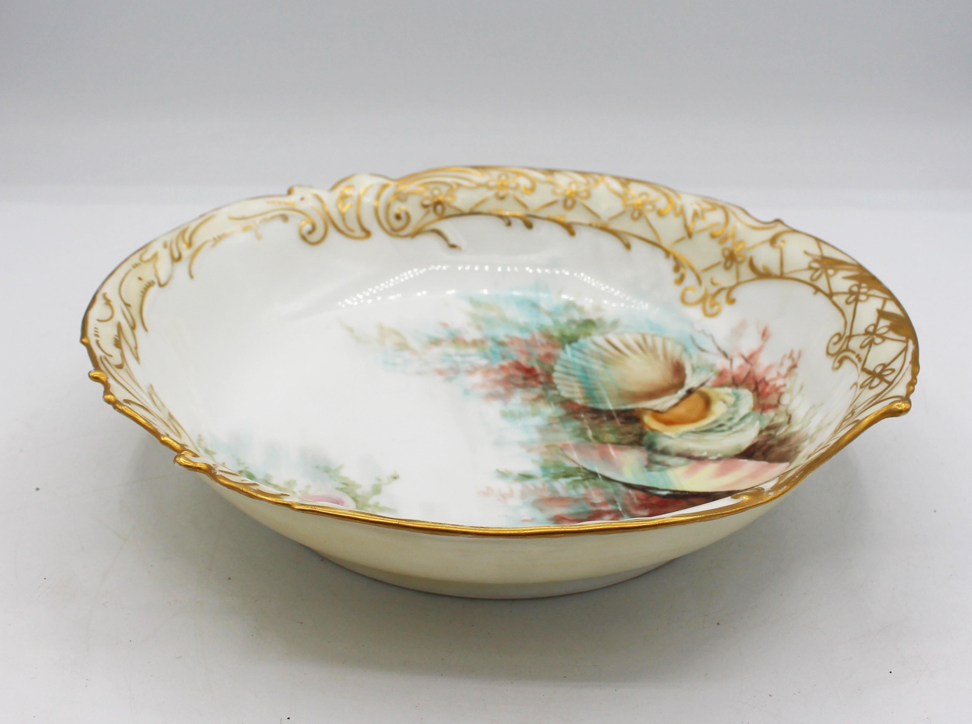 1891-1911 French Limoges porcelain shell form bowl. By A.A. Rose. Elite Limoges France marks. Exceptionally elegant, note the pâte-sur-pâte sweeping gently across creating the effect of moving ocean water across the shells. Very good