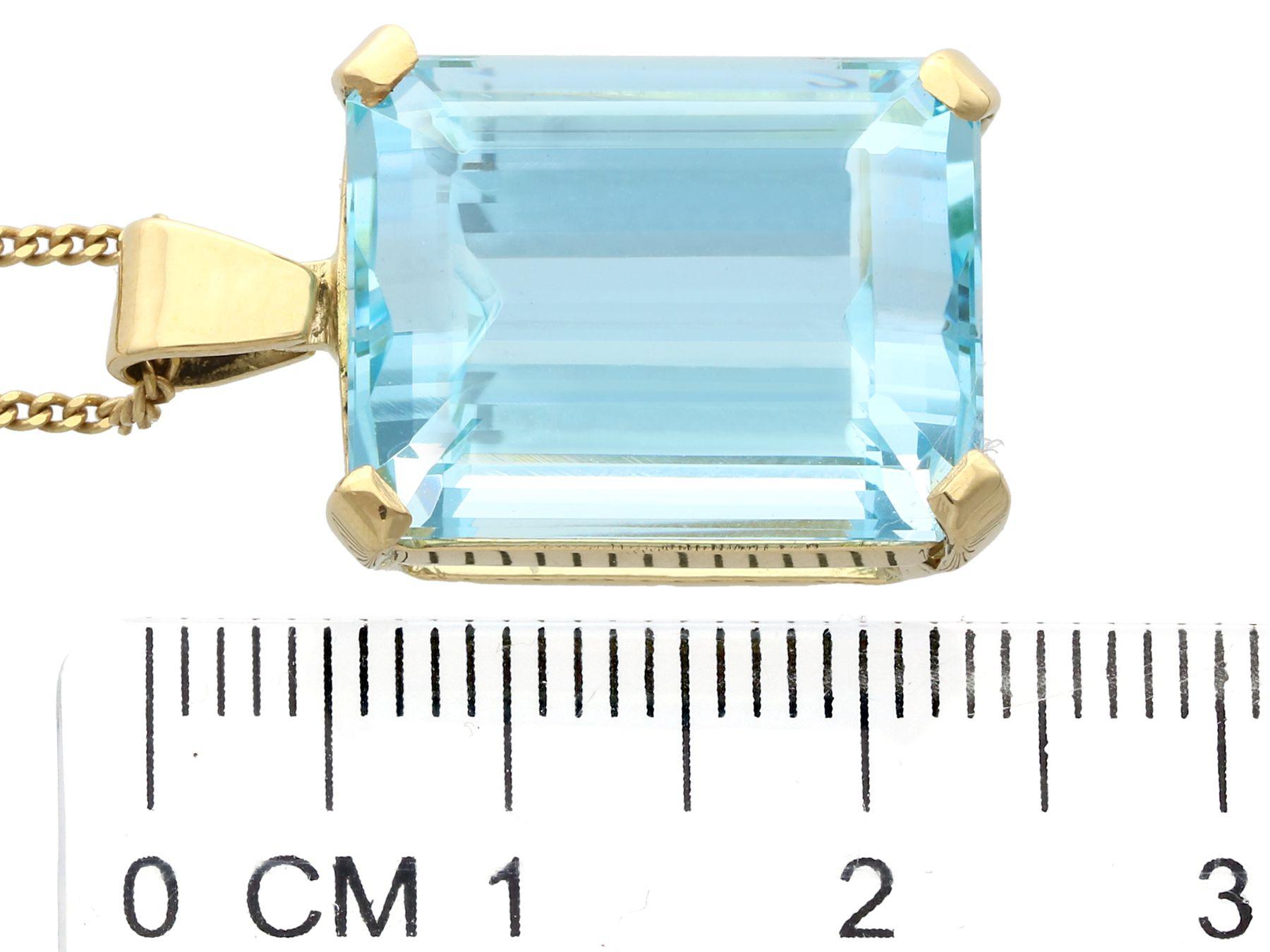 Emerald Cut 18.93 Carat Aquamarine Yellow Gold Pendant For Sale