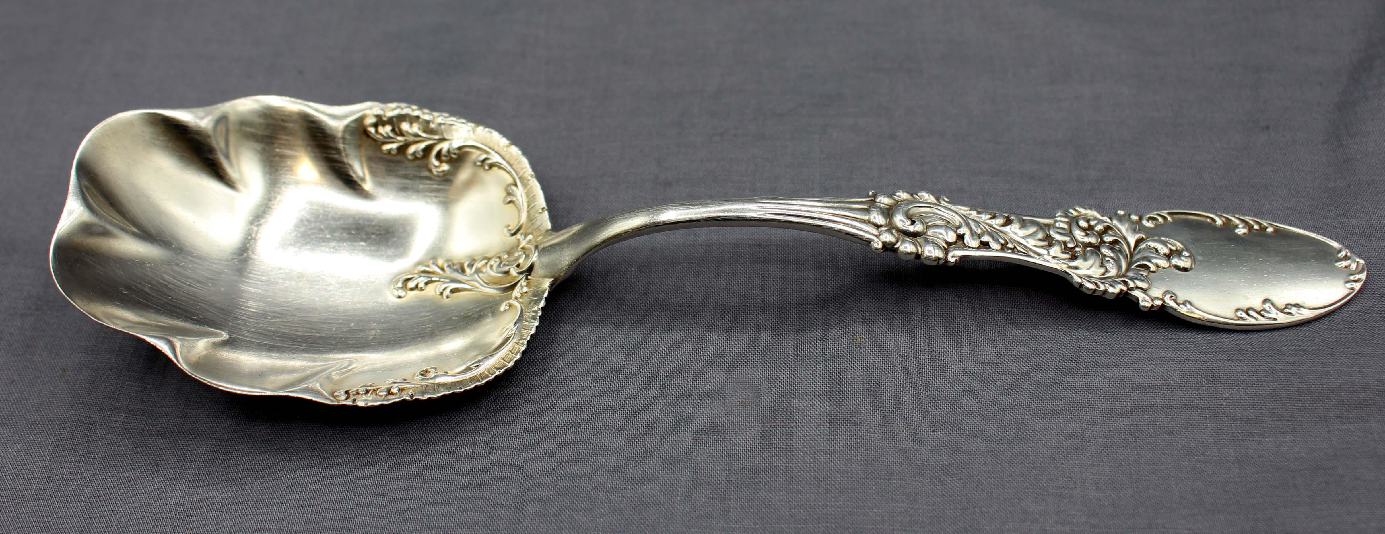1893 sterling silver berry spoon by Frank Whiting. This ornate spoon is not of a listed pattern. 2.45 troy oz.
8 3/4