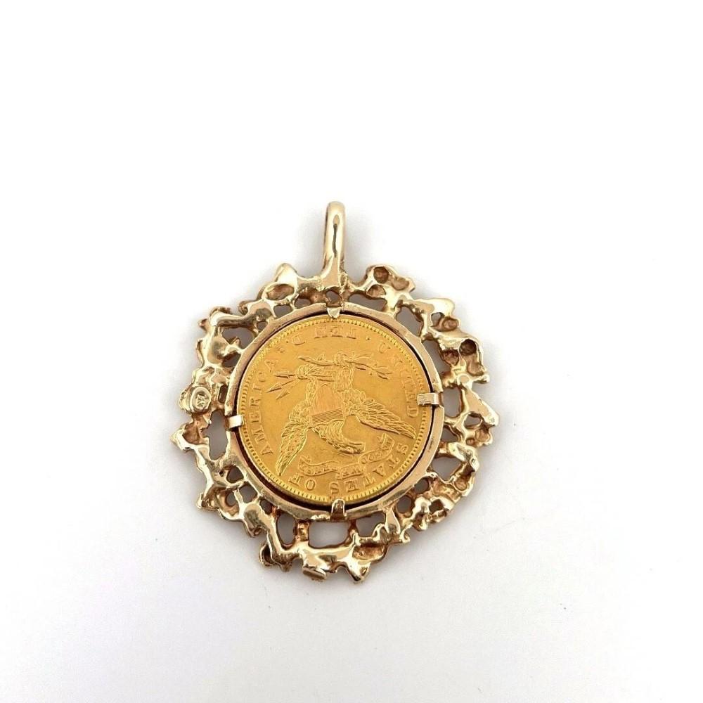 1895 $10 Liberty Head Coin Pendant – Framed in Freeform 14K Yellow Gold – 30.17g
Offered by a Private Jeweler & Certified Master Appraiser

✦ ✦ Only Pendant, No necklace ✦ ✦ 

This bold and timeless pendant features an authentic 1895 Liberty Head