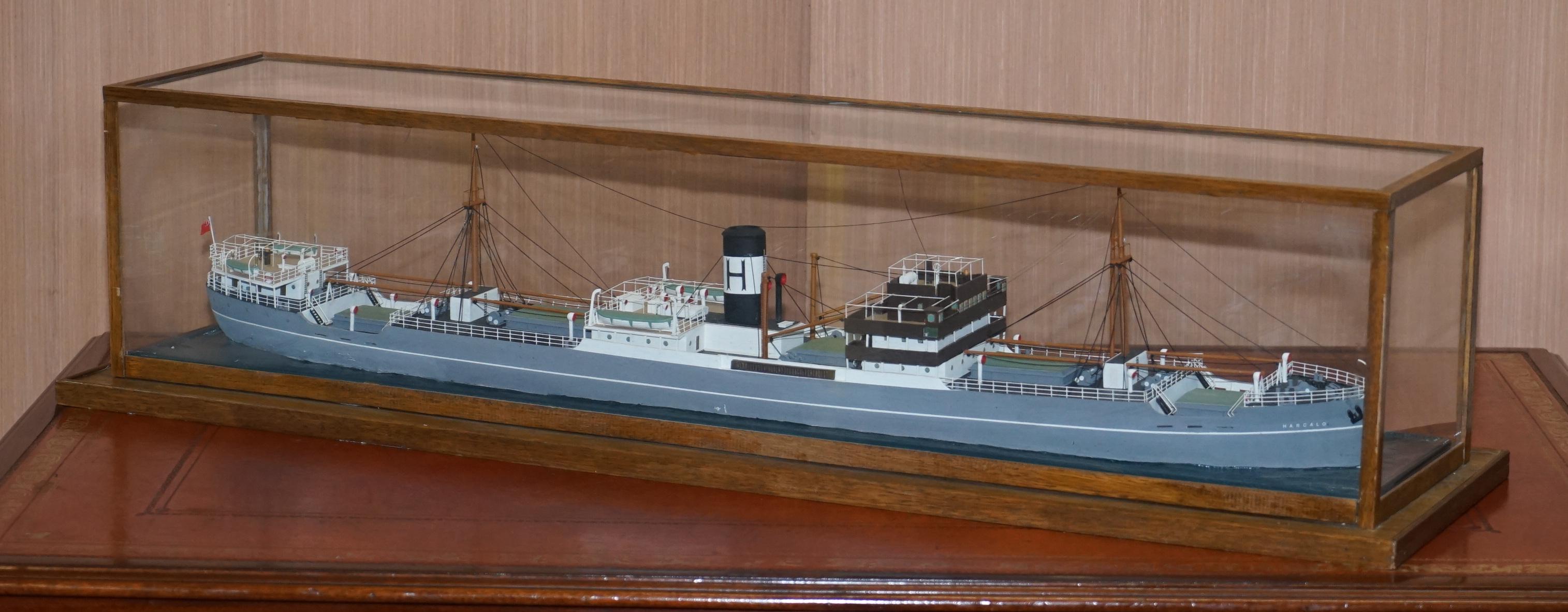 We are delighted to offer for sale this stunning hand made model ship in original display case of the S.S Harcalo Steam cargo ship, 1895-1907

This piece is one of four large scales model ships I have for sale, the others are all listed under my
