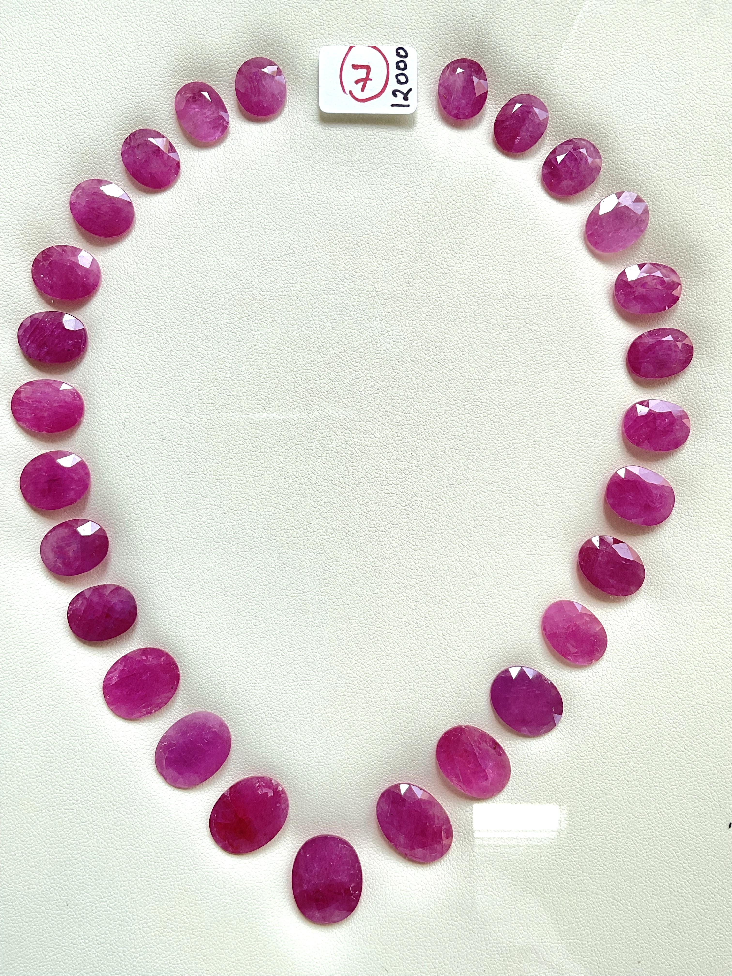 Art déco 189.56 carats ruby Mozambique cut stone oval 27 Pieces layout heated natural gem en vente