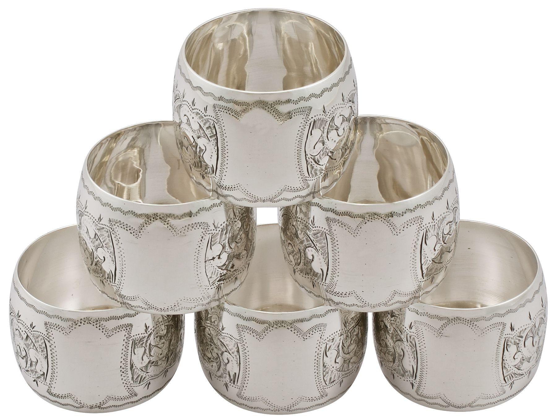 An exceptional, fine and impressive set of six antique Victorian English sterling silver napkin rings - boxed; an addition to our dining silverware collection

This exceptional set of antique George V silver napkin rings consists of six napkin