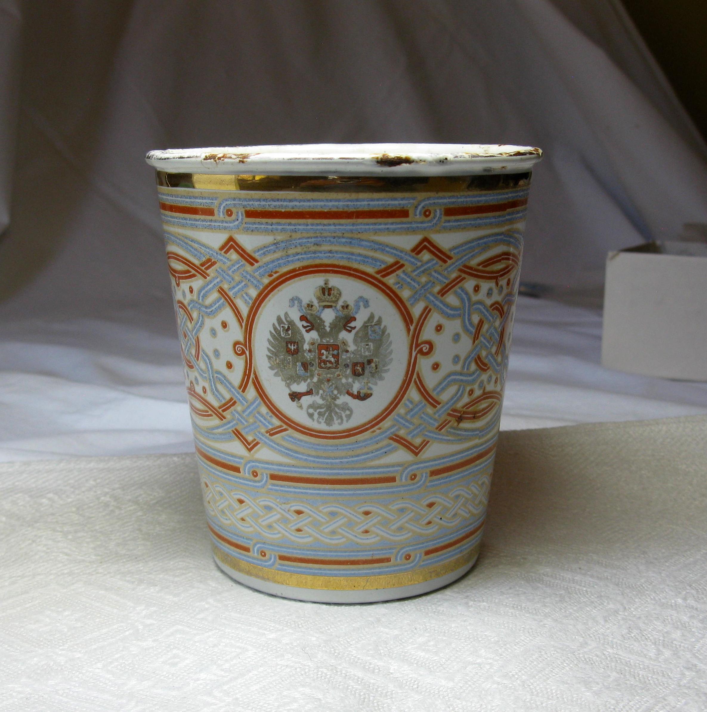 This rare Russian Enamel Coronation Cup was designed for the coronation of Tsar Nicholas II and Tsarina Alexandra Feodorovna in 1896.  It became known as the Khodynka Cup of Sorrows. The cup bears the cyphers of Czar Nicholas and Alexandra