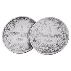 Spilla con moneta da 1 scellino della Repubblica Sudafricana (ZAR) del 1896