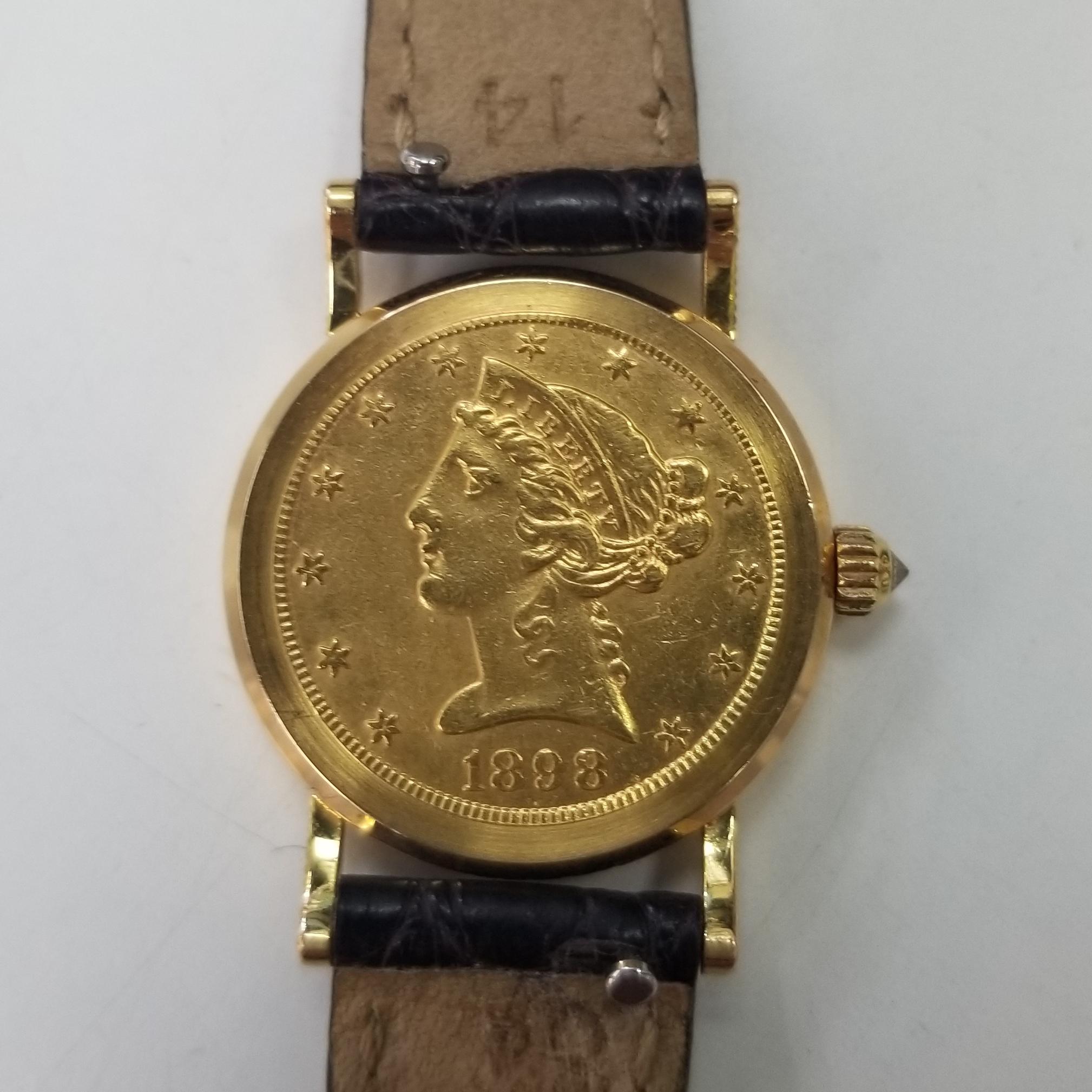 About
1898 $5 Gold Eagle-Liberty Corum Quartz Watch

Watch is keeping good time
Case is 25mm
Leather band
Excellent condition

    Brand: Corum 100% original
    Movement: Quartz
    Case: 18K yellow gold
    Leather belt
    Crystal: Sapphire
   