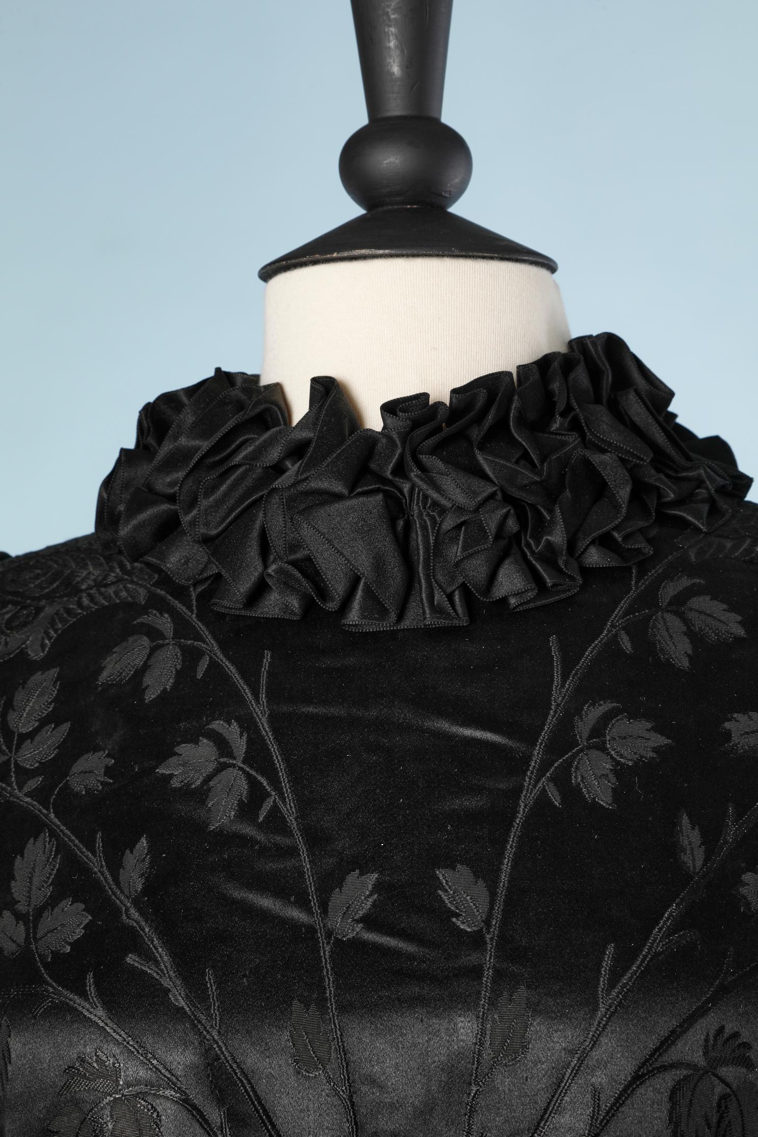 1898 Black jacquard damask silk dress with ruban ruffles around neck and bottom edge.
Lining in silk jacquard as well with ruffles on the bottom edge. 
Tiny buttons to close the dress on the middle back and some on the cuffs as well.