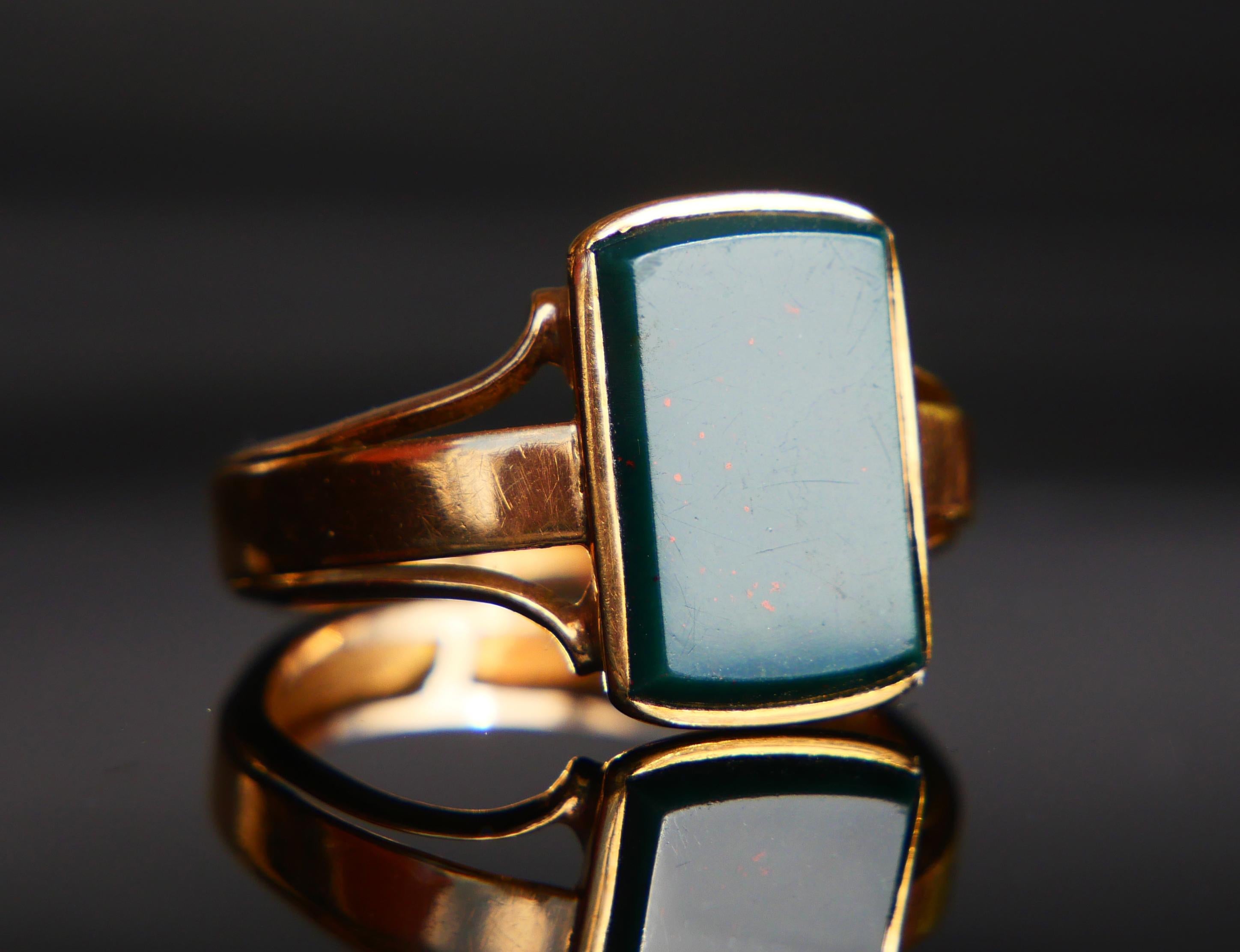 Antique Signet  Ring in solid 18K Yellow Gold with bezel set Blood - stone,color is dark Green color with red dots, measures ca. 14 mm x 10 mm x 4.3 mm deep / ca 11 ct. 

The band is 4,6 mm at the narrowest ,hallmarked with a full set of Swedish