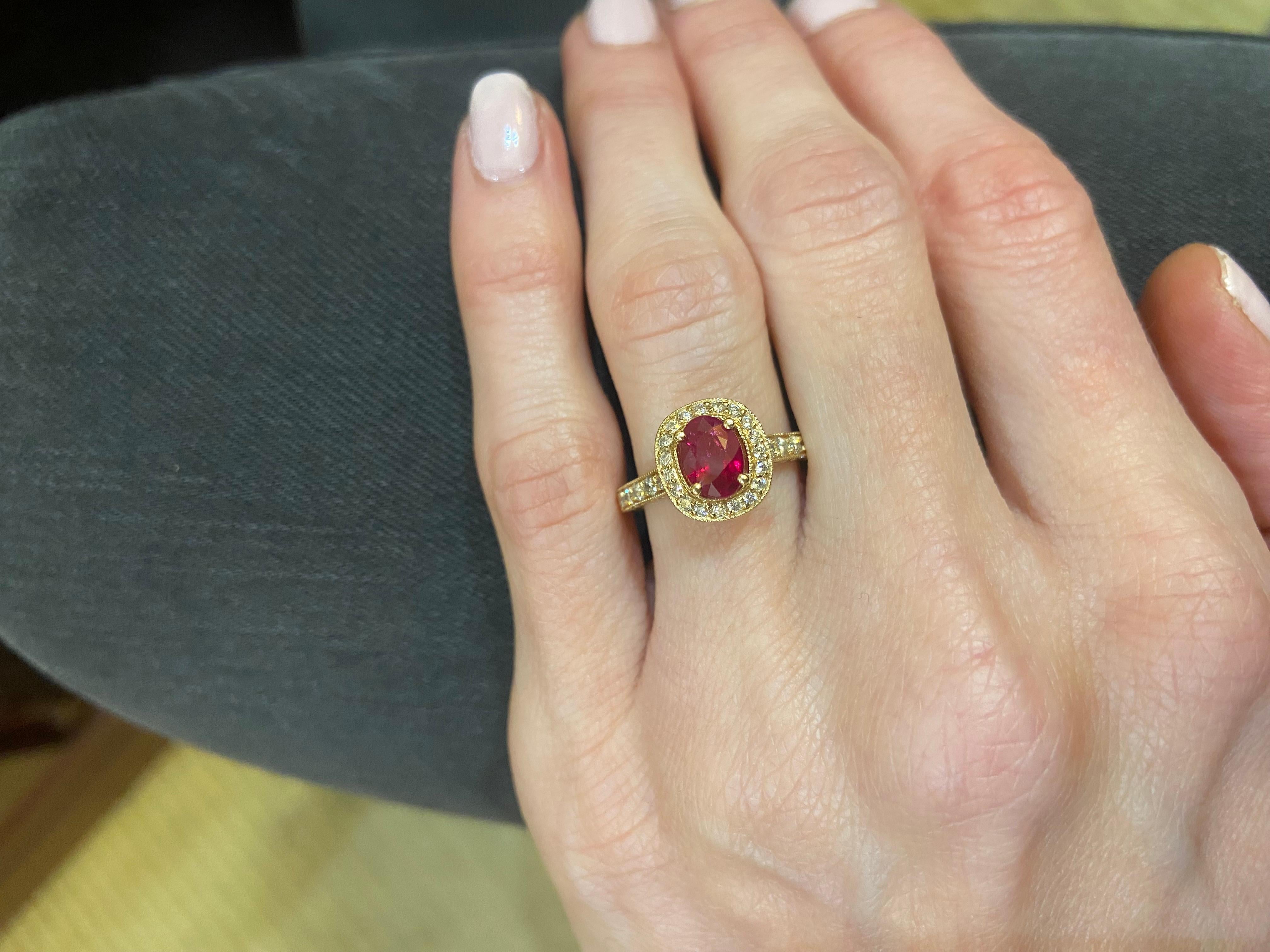 Metal: 14KT Yellow Gold
Finger Size: 6.5
(Size is 6.5, but is sizable upon request)

Number of Oval Rubies: 1
Carat Weight: 1.13ctw
Stone Size: 7 x 5mm

Number of Round Diamonds: 82
Carat Weight: 0.76ctw