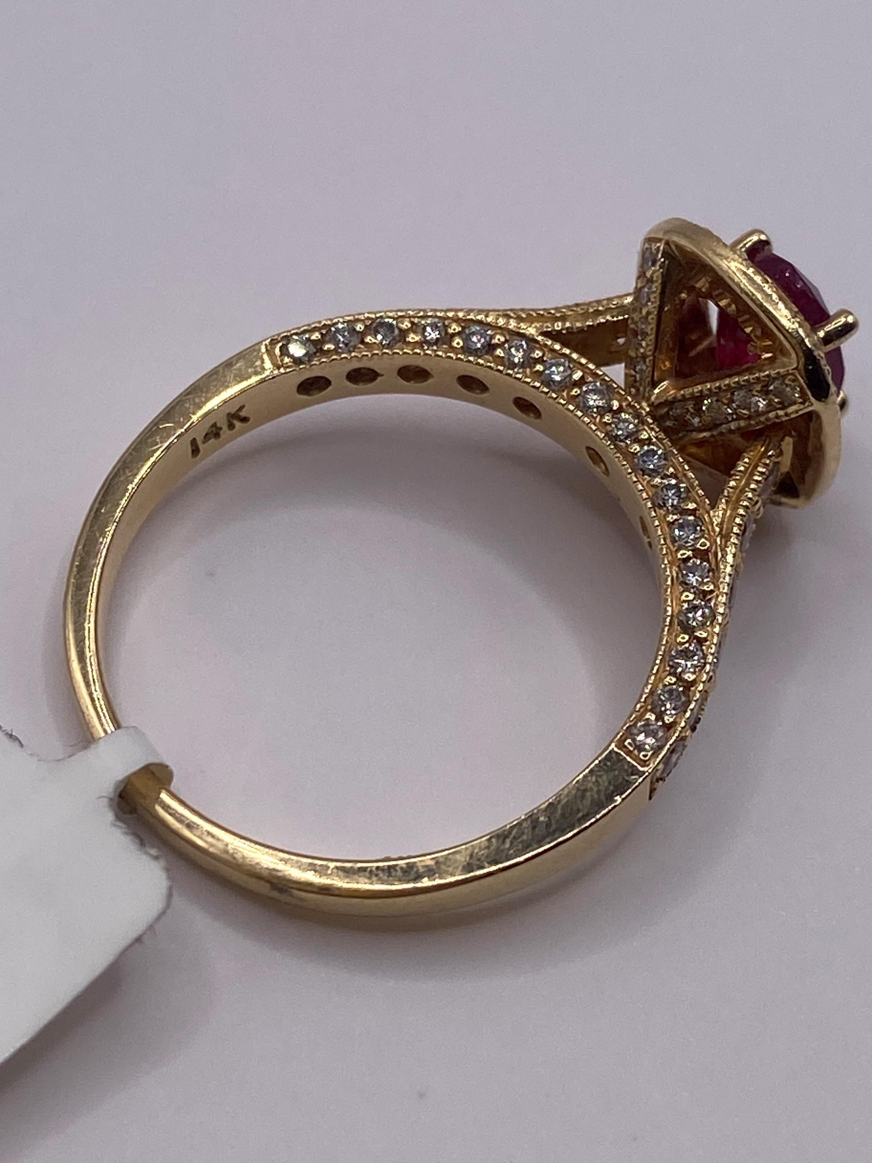 Women's or Men's 1.89ctw Oval Ruby & Round Diamond Halo Ring in 14KT Yellow Gold For Sale