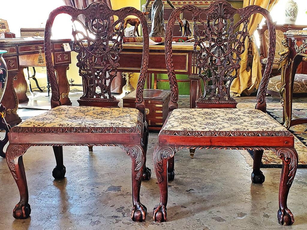 Presenting a stunning 18th century pair of large Chippendale style ribbonback chairs.

British, circa 1780–1800.

Oversized ‘period’ chairs with gorgeous ribbonback carving on the back splats.

In the style of chairs originally designed by the