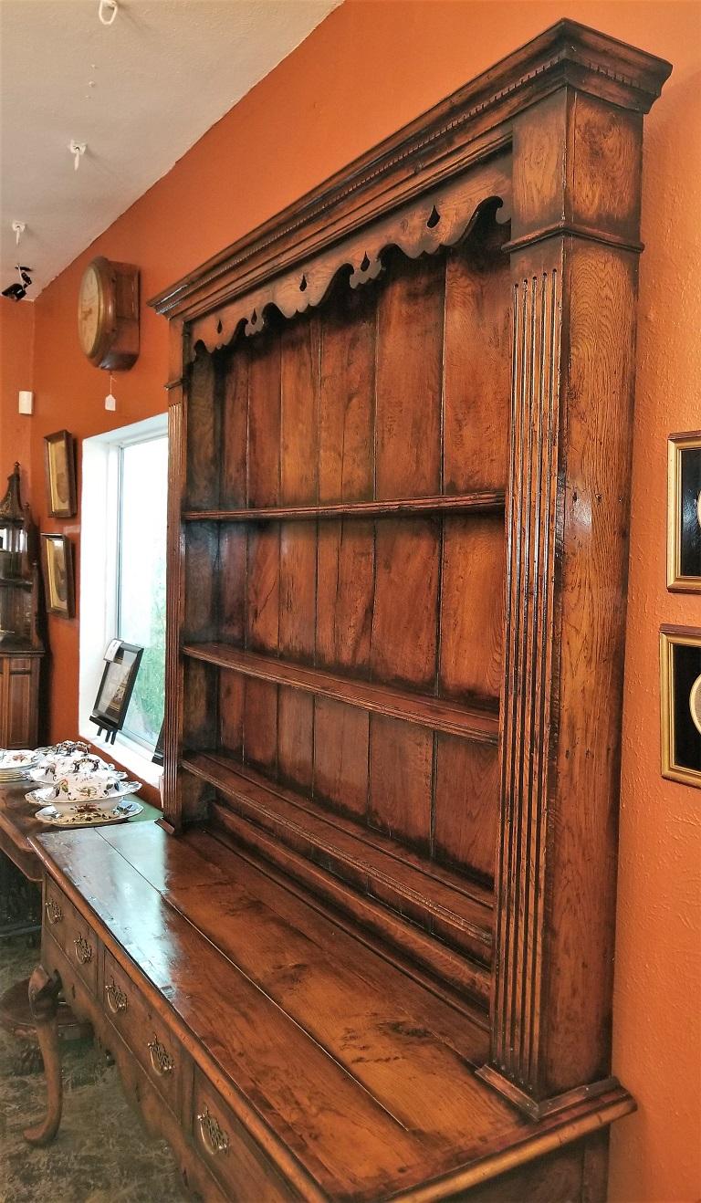 Presenting a stunning example of an 18th century welsh dresser from circa 1790.

The patina to this piece is simply gorgeous.

Made of elm and sycamore it has glorious natural patina of over 200 years of use and wax.

Georgian … George III