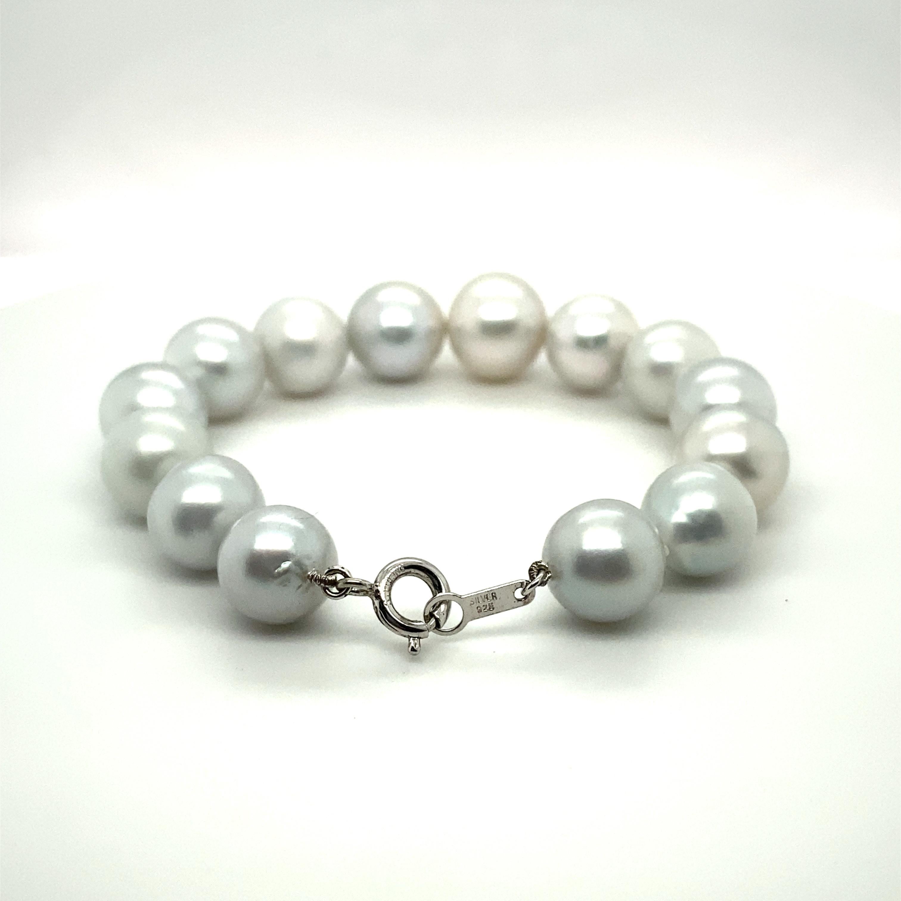 Be prepared to be bewitched by the beauty of this 18CM Silver South Sea Pearl Sterling Silver Clasp Bracelet. 
It is a small setting for a small wrist and features a standard sterling silver clasp.

Pearls graduating in size from 10.7mm to