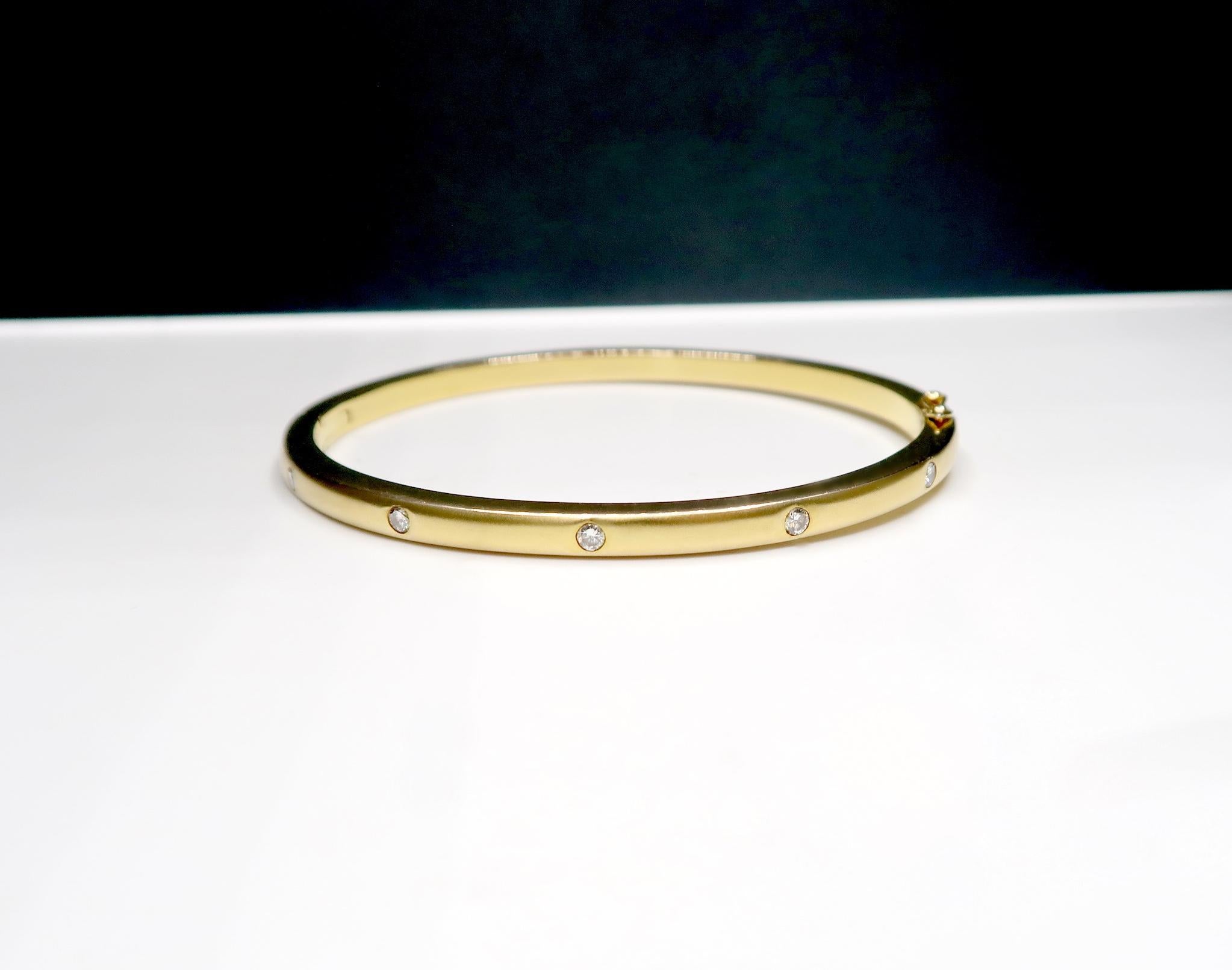 Women's or Men's Stackable Matte Thin Bangle in 18k Yellow Gold with Diamonds Evenly Spaced For Sale