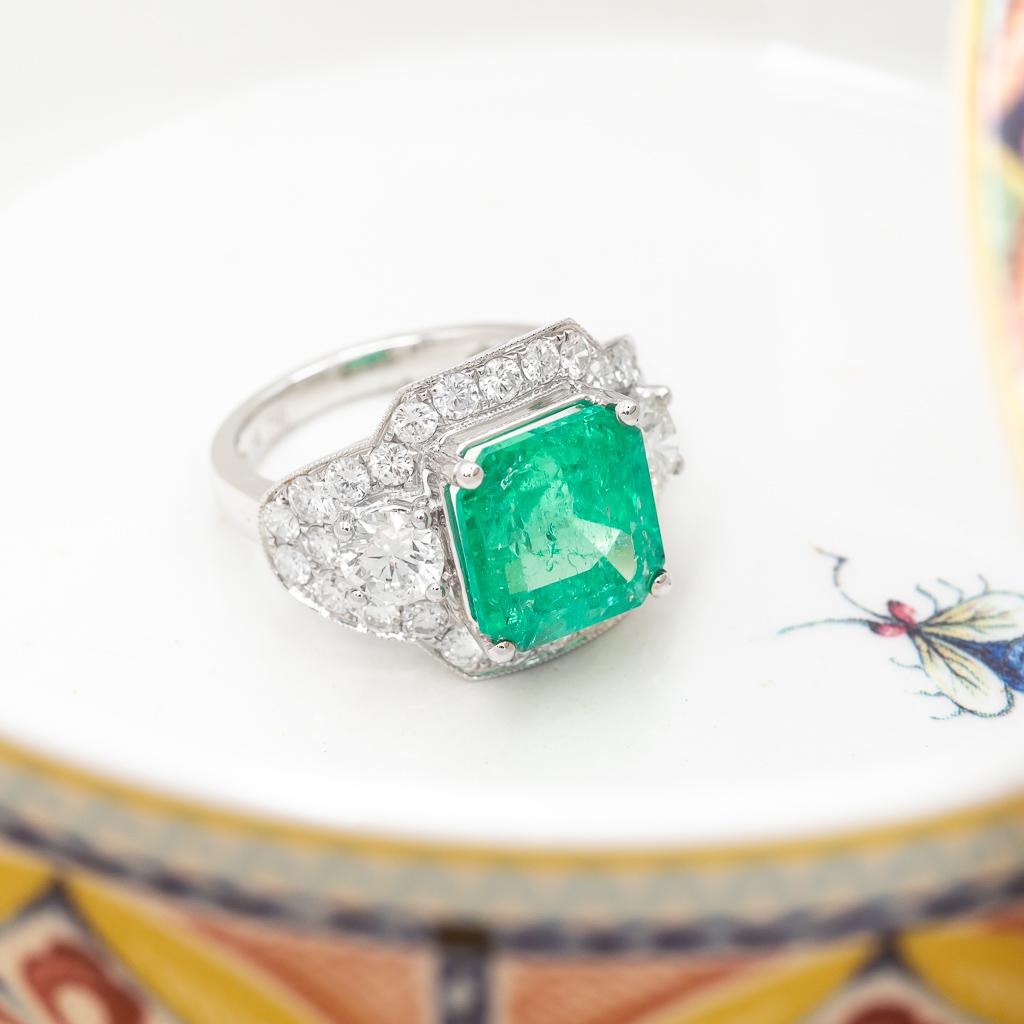 18ct 5.7ct Natural Emerald & 2.65ct TDW Diamond Statement Ring Size N

This showstopping new creation was designed and made at Monty's. It features an incredible 5.70ct natural emerald set in 18ct white gold, with 30 diamonds for added