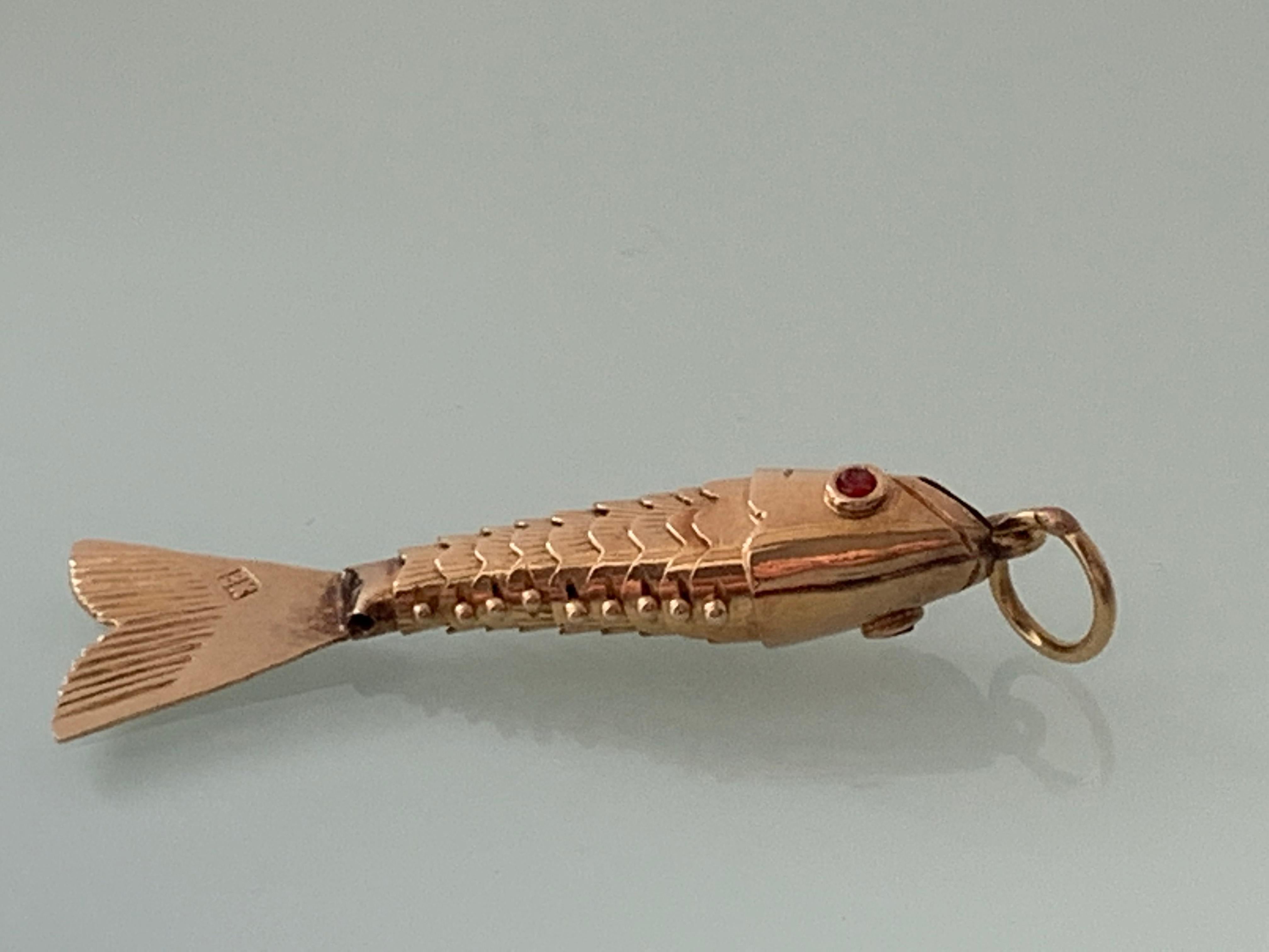14k gold articulated fish pendant