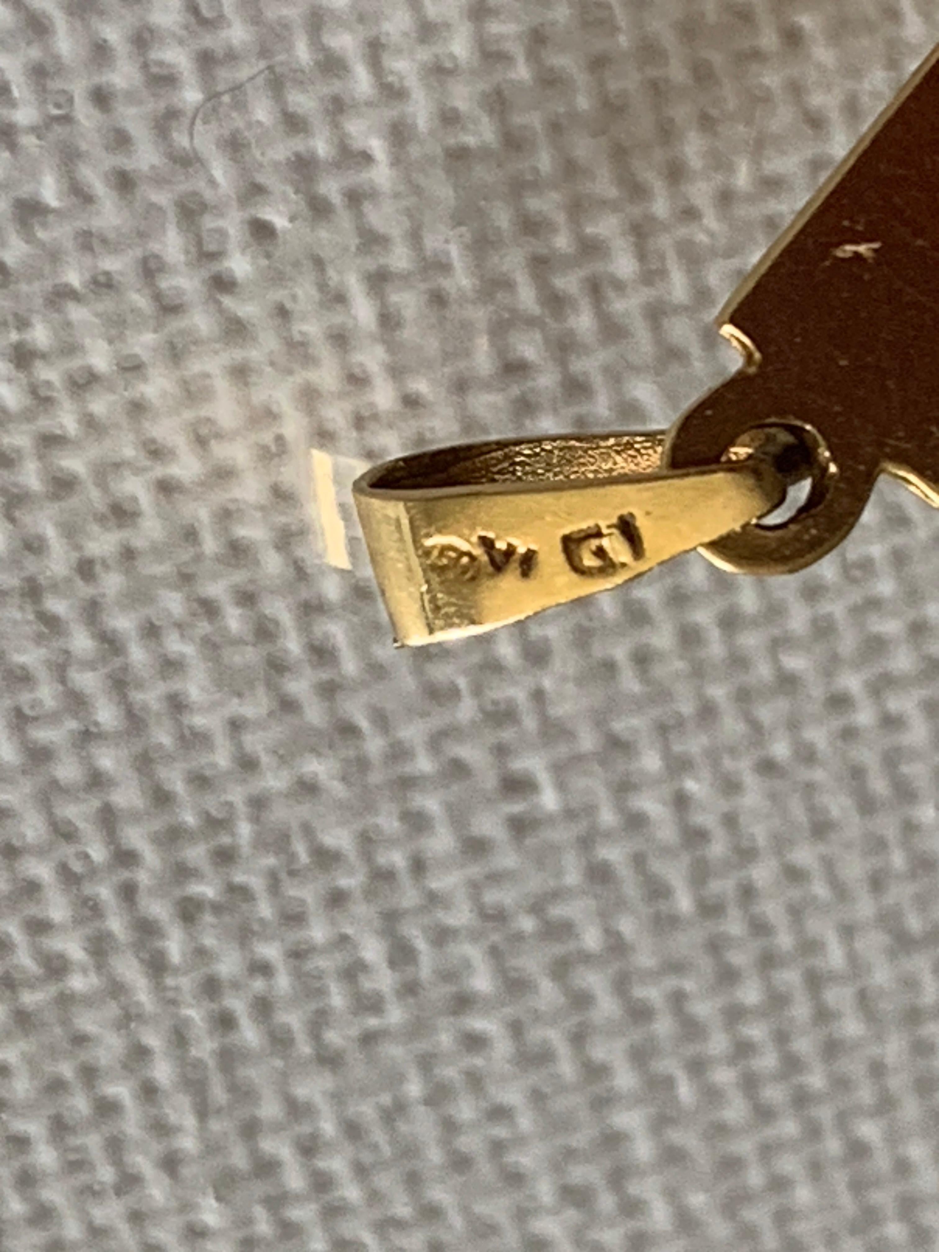 Croix en or 750 millièmes (18ct) avec inscription 