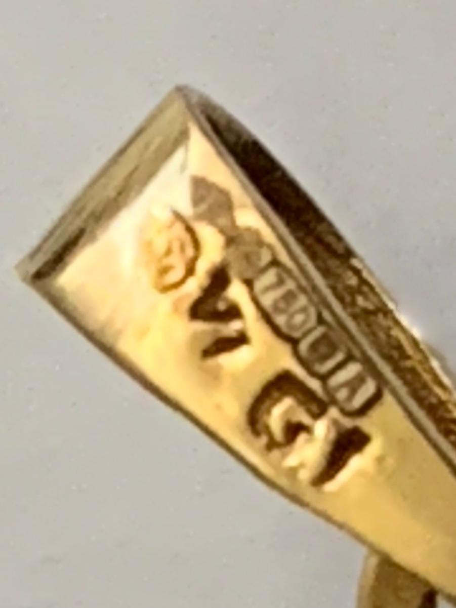 Cruz de oro 750 de 18 ct con la inscripción 