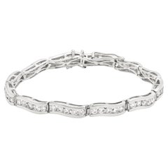 18ct Contemporary White gold diamond-set wave bracelet