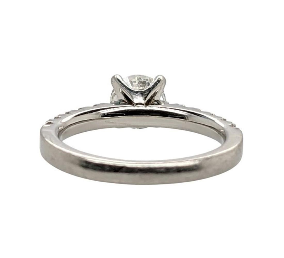 18ct White gold handmade diamond Ring

Approx 4.2 grams in weight. 

The ring contains cone central round brilliant cut diamond, 
Carat - 0.74 ct, 
Colour - E , 
Clarity - SI1

Triple excellent, nil fluorescence, GIA certificate number