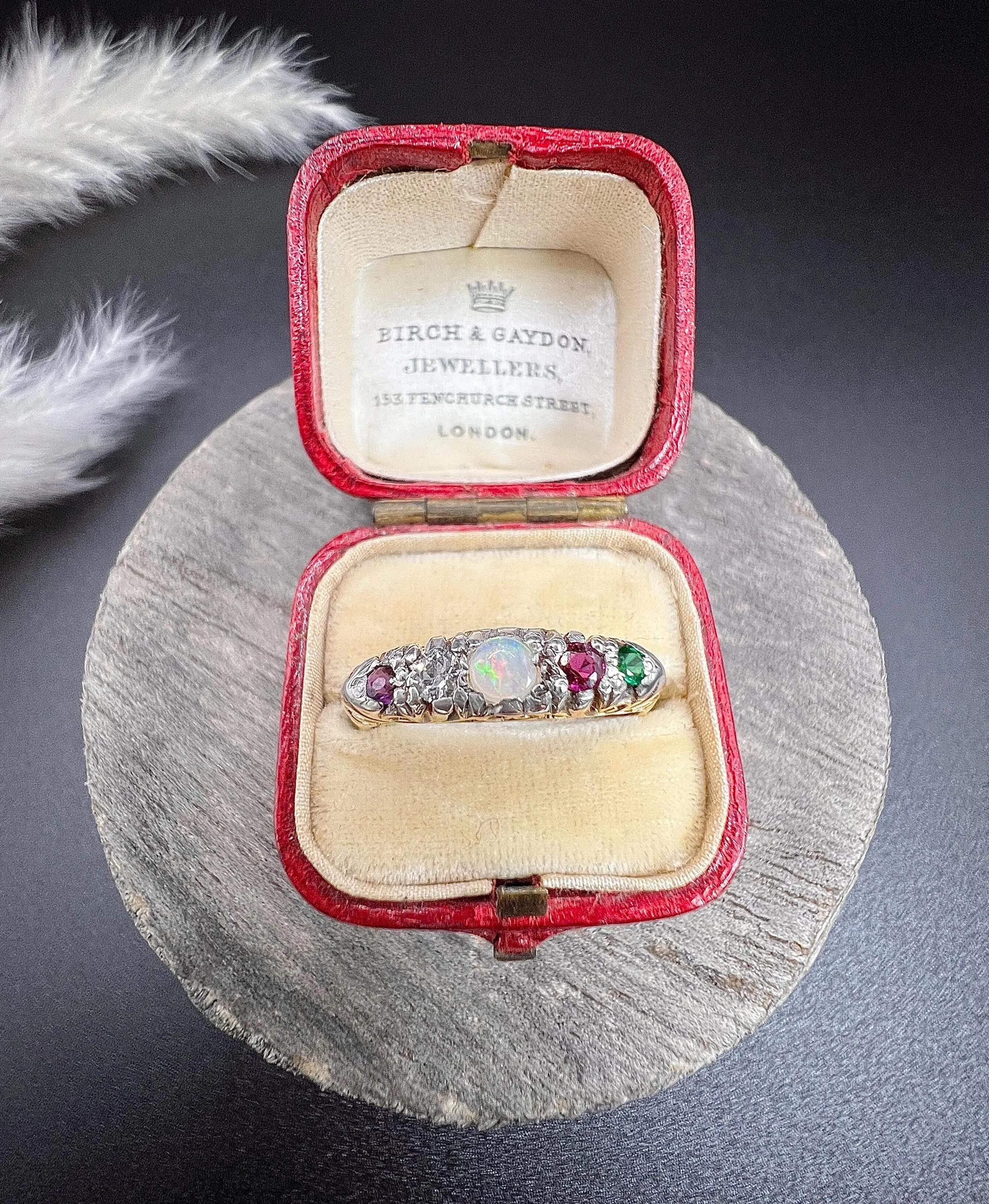 18ct Gold 1920s ADORE Amethyst, Diamond, Opal, Ruby & Emerald Carved Ring In Good Condition In Brighton, GB