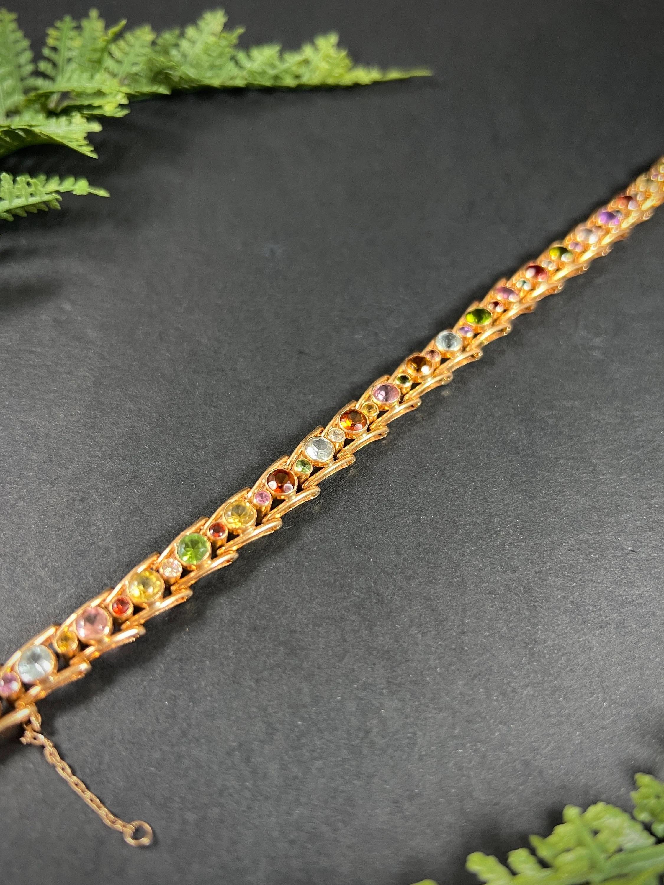 18ct Gold 1980s Citrine, Aquamarine, Pink Tourmaline, Peridot Harlequin Bracelet In Good Condition For Sale In Brighton, GB
