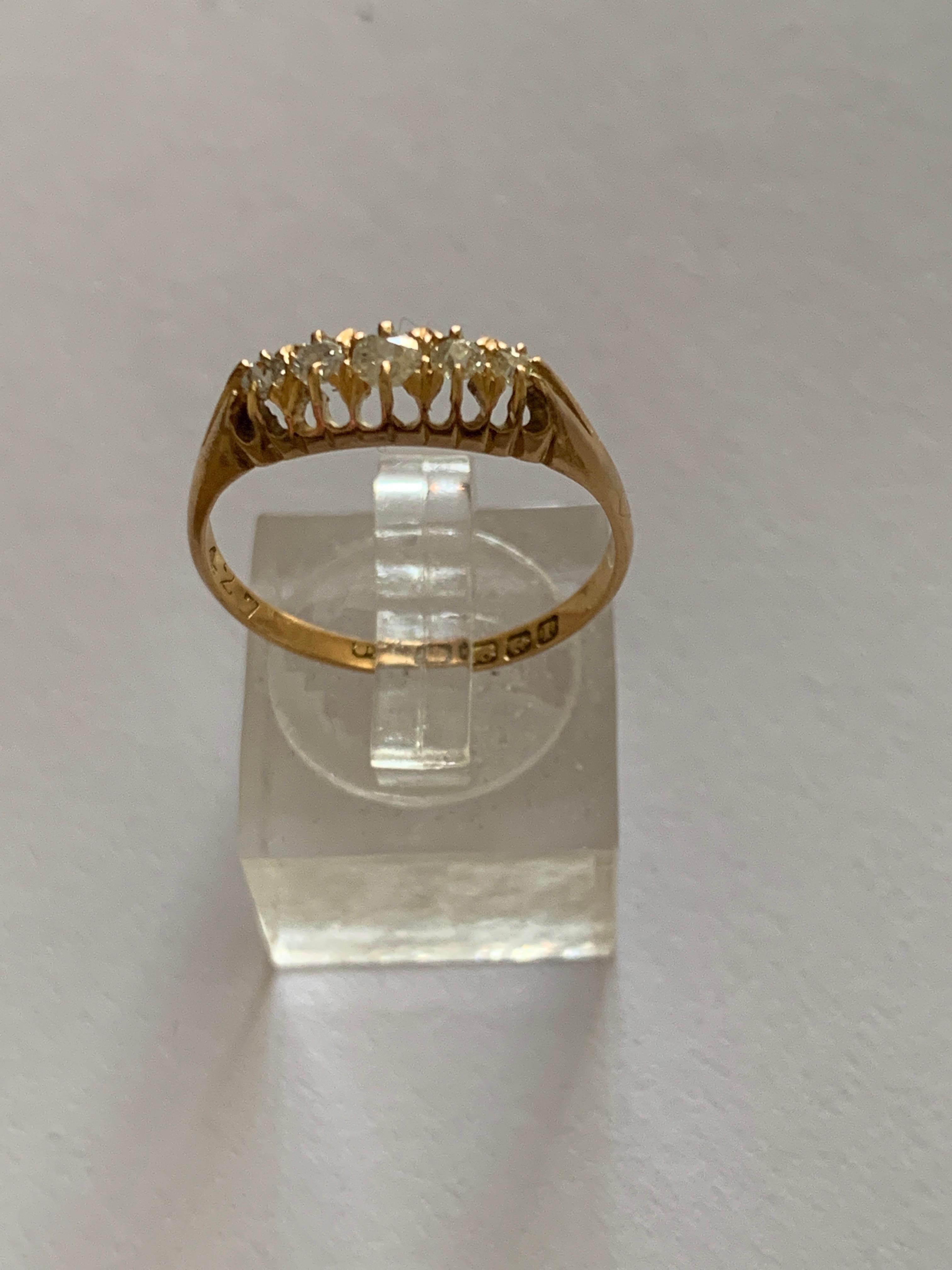 18ct Gold Antique Diamond ring
0.33 Carat
each diamond is a beautiful high quality earth mined diamond
very clear lively diamonds

Size - inner diameter 18.8mm = R 1/2
Weight 2.42 grams

Dated 1857 stamped at Birmingham assay offices.