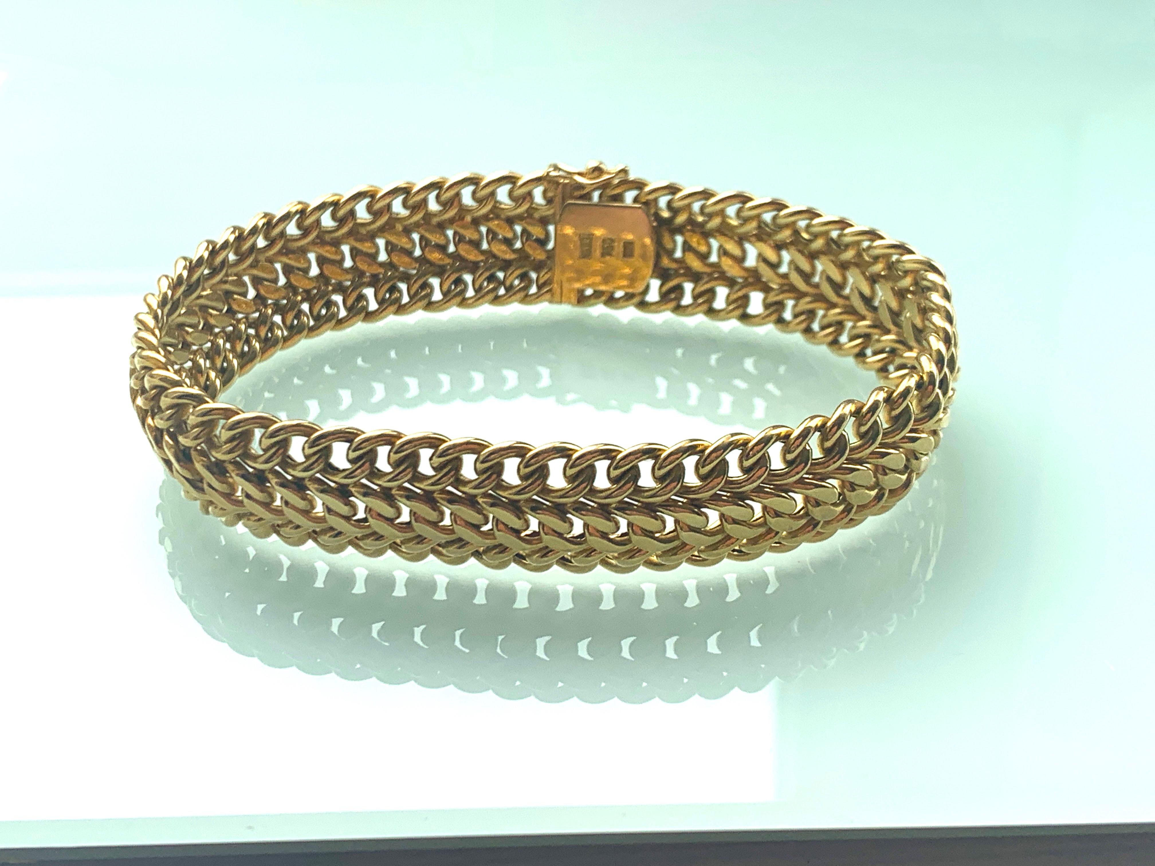 18ct 750 Woven Gold 
The gold colour is very modern and bright 
Era 1980s
Makers Unknown
Secure tight clasp.
Strong sturdy bracelet 