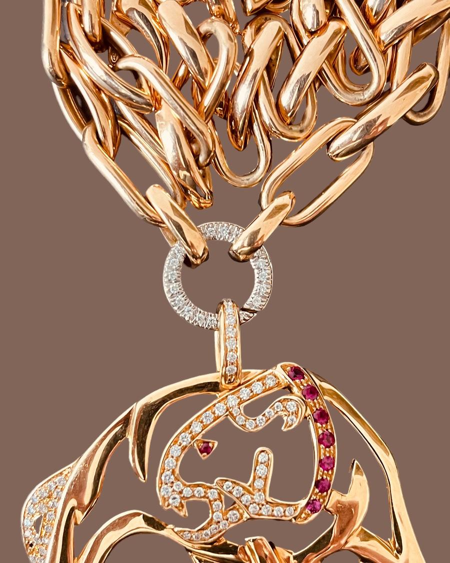 18ct Gold Chain To Suspended Diamond Ring and Diamond & Ruby Jaguar Pendant In Excellent Condition For Sale In London, GB