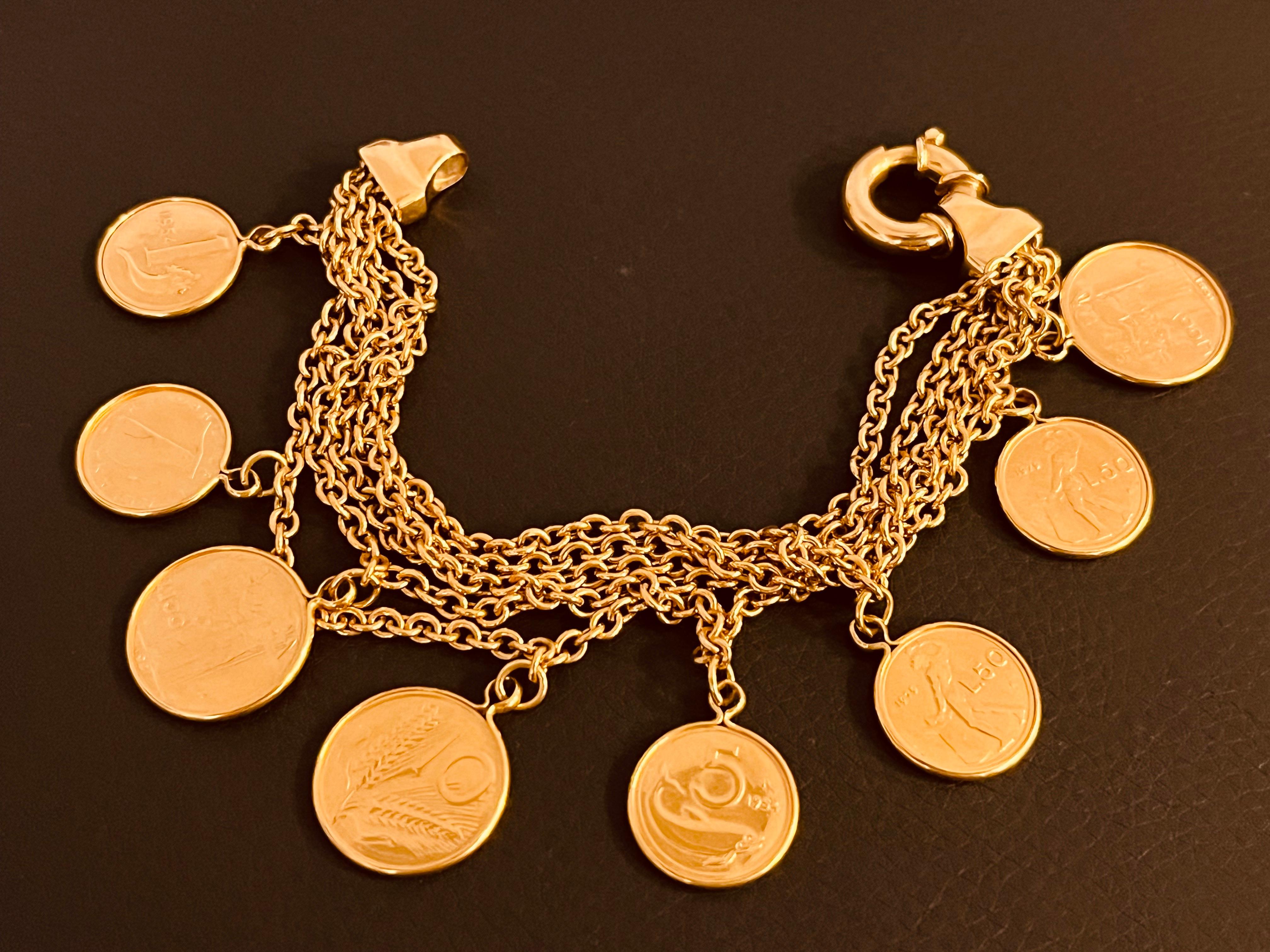 18ct Gold Coin Bracelet Of 5 Rows Of Trace Chain Suspending 8 Italian Gold Coins 5