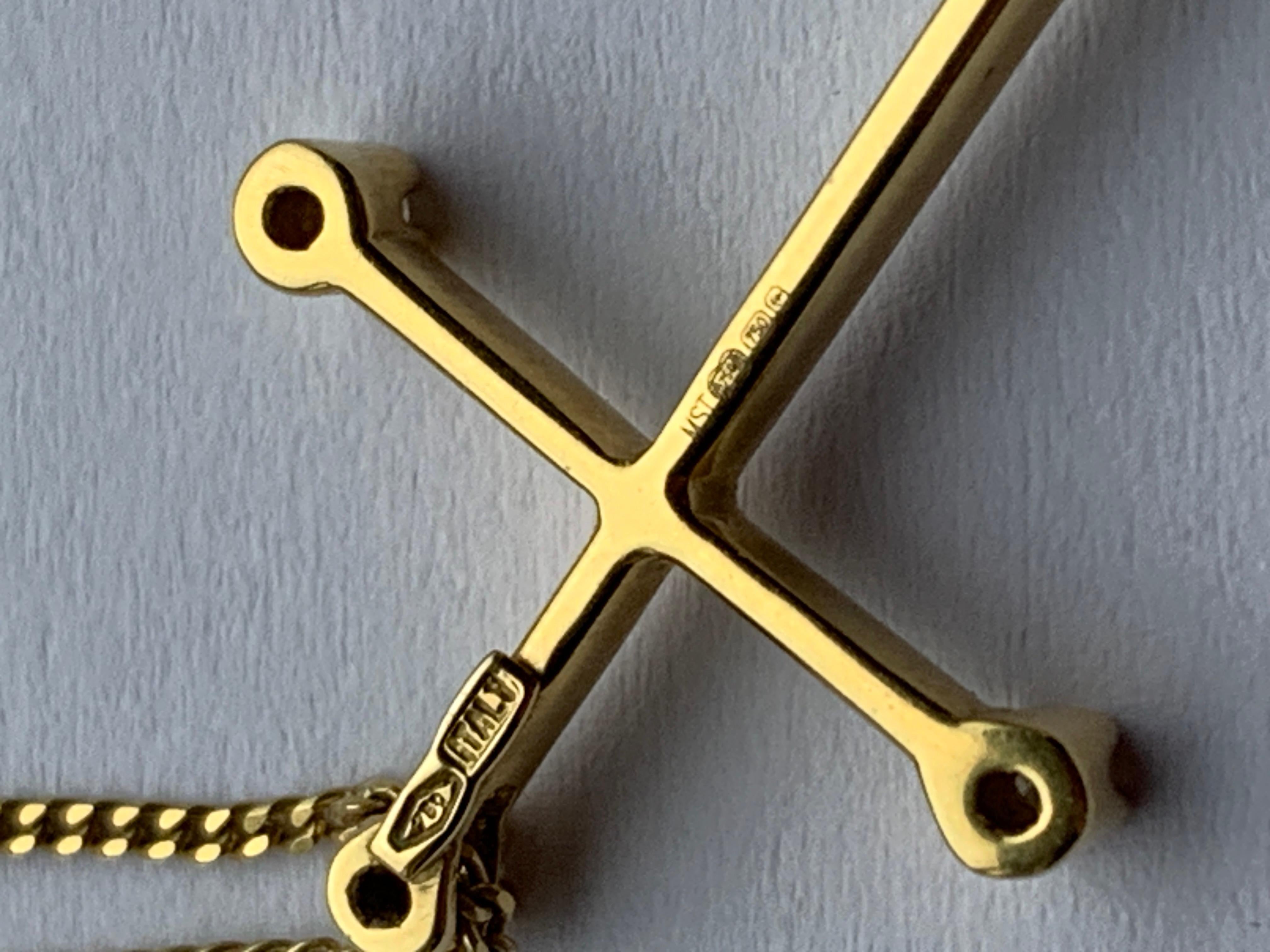 Croix en or 18ct avec diamant et chaîne de 16