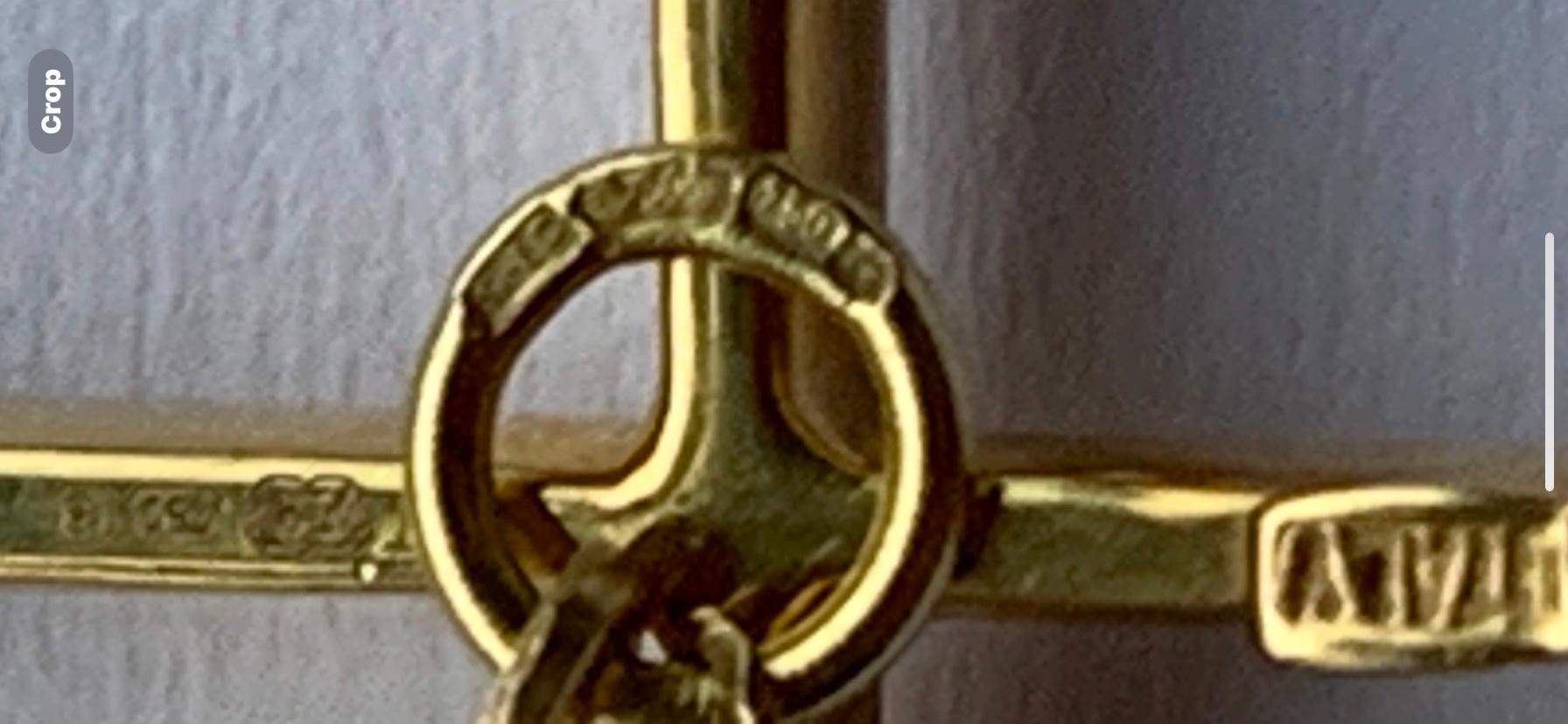 Croix en or 18ct avec diamant et chaîne de 16