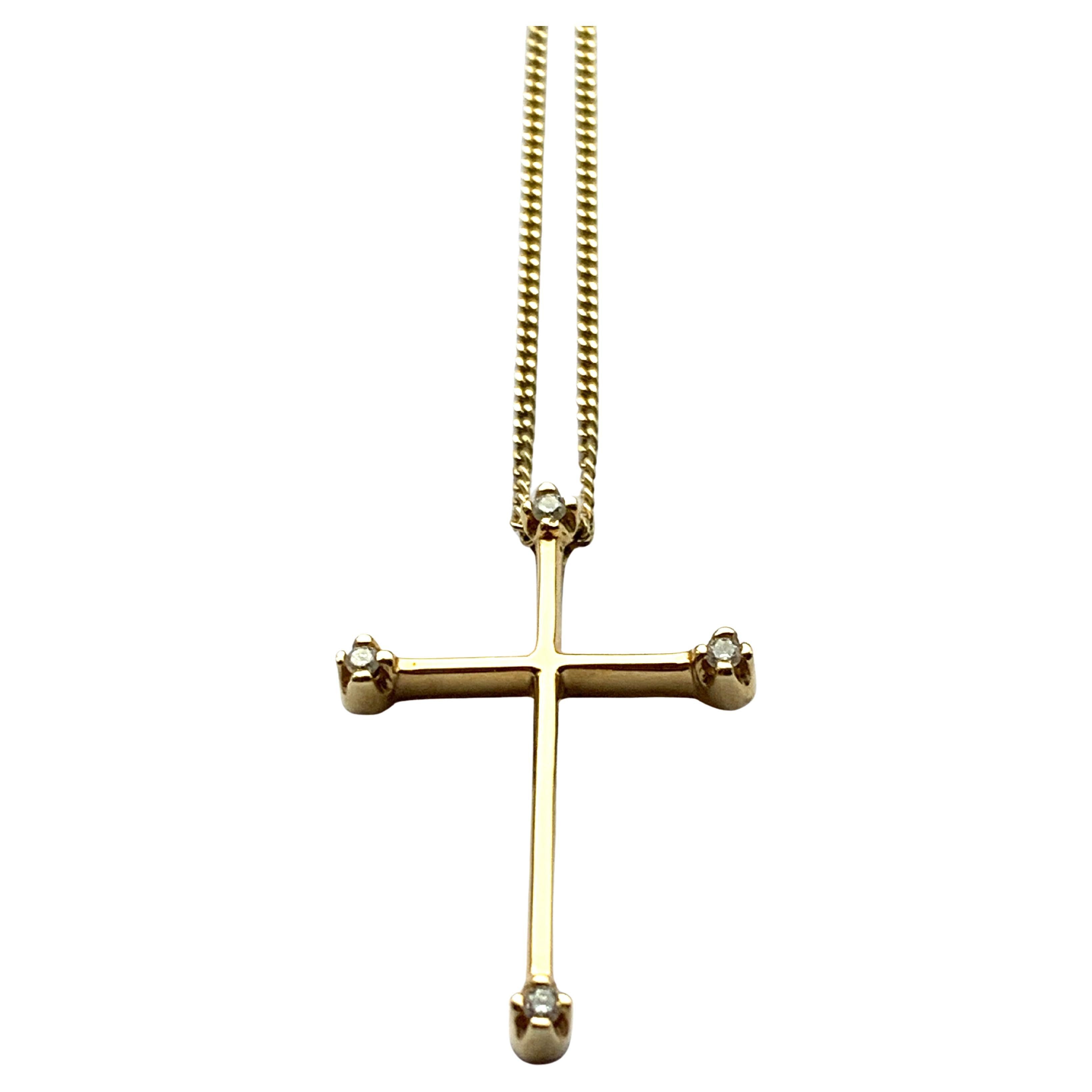 Croix en or 18ct avec diamant et chaîne de 16" en or 18ct