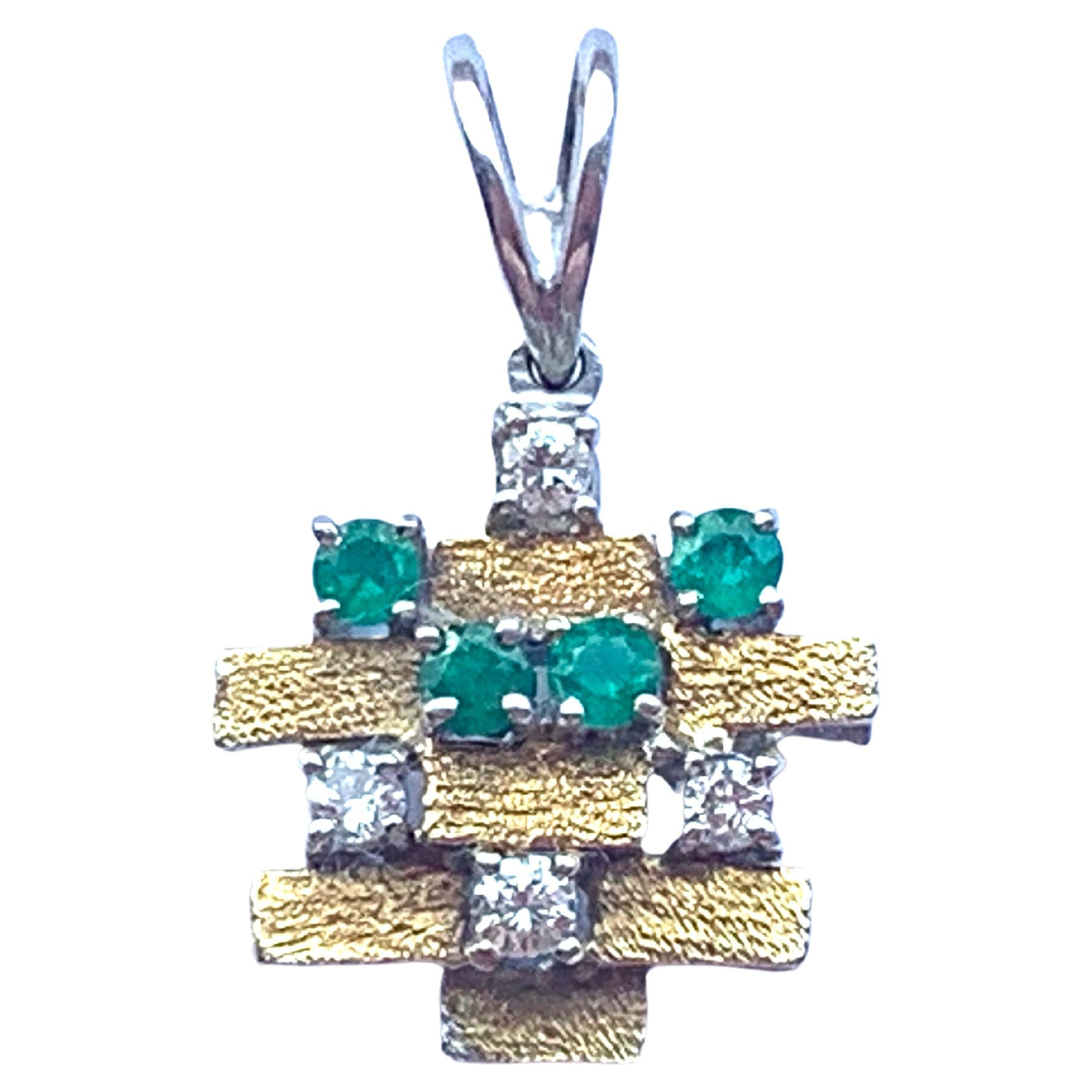 Stunning Brutalist Design
18ct White Gold & Yellow Gold Brick design finish 
adorned with diamonds & emeralds 
4 x 2.5mm diamonds = 0.24 Carats 
4 x 2.5mm Emeralds = 0.24 Carats
Stamped 750 and two other marks which have faded over time.
on a white