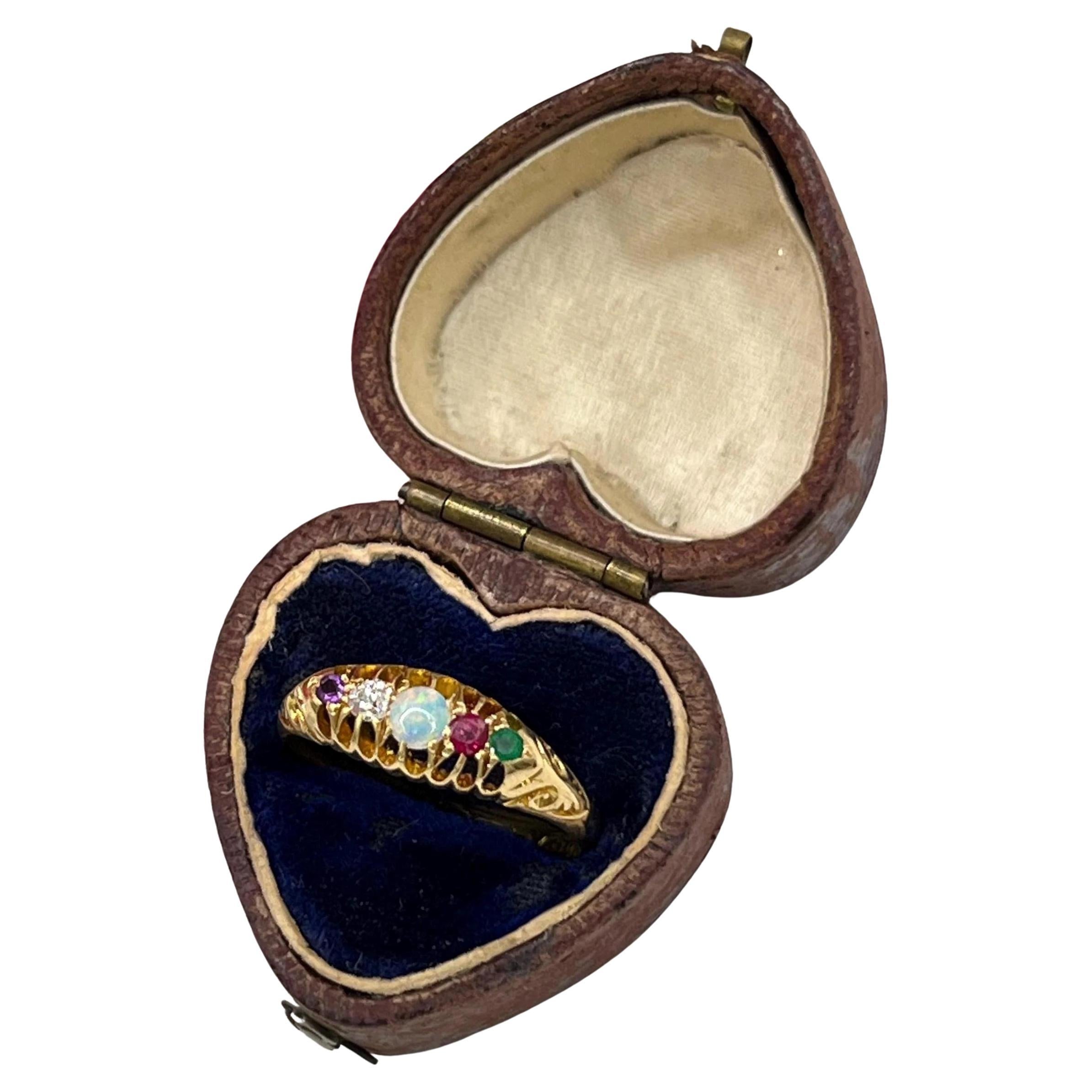 18ct Gold Edwardian, Acrostic ADORE Ring: Amethyst, Diamond, Opal, Ruby, Emerald For Sale