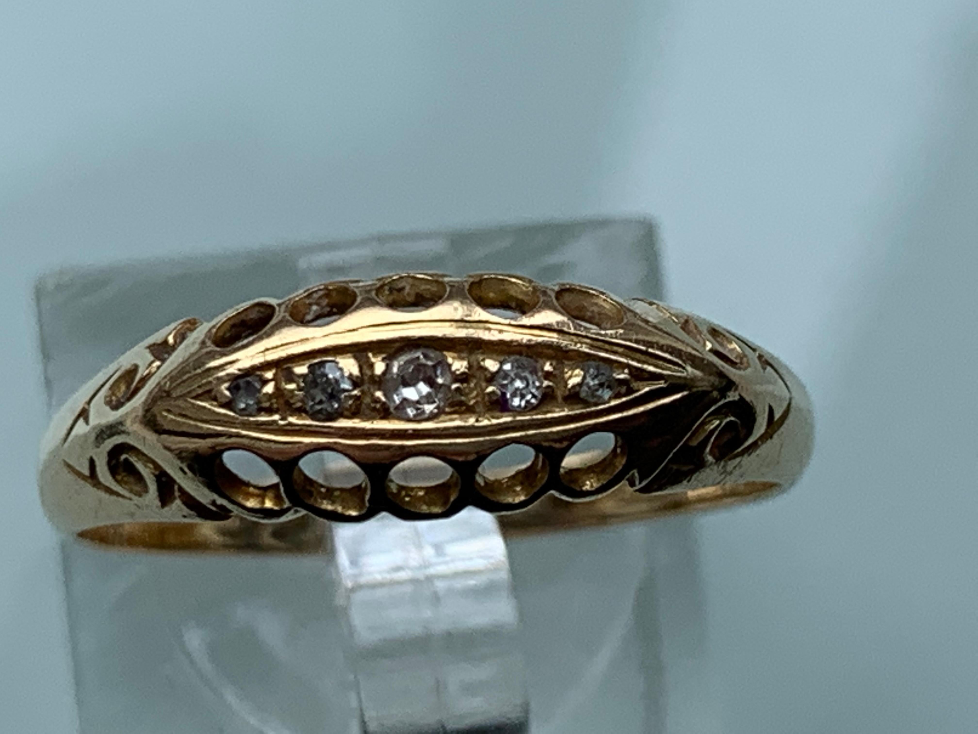 18ct 750 Gold Antique Edwardian Diamond Ring 
Five mine cut Natural Diamonds 1mm , 1.75mm, 2mm, 1.75mm x 1mm
Total = 0.08 Carats
S B & S Ltd  Dated 1905 