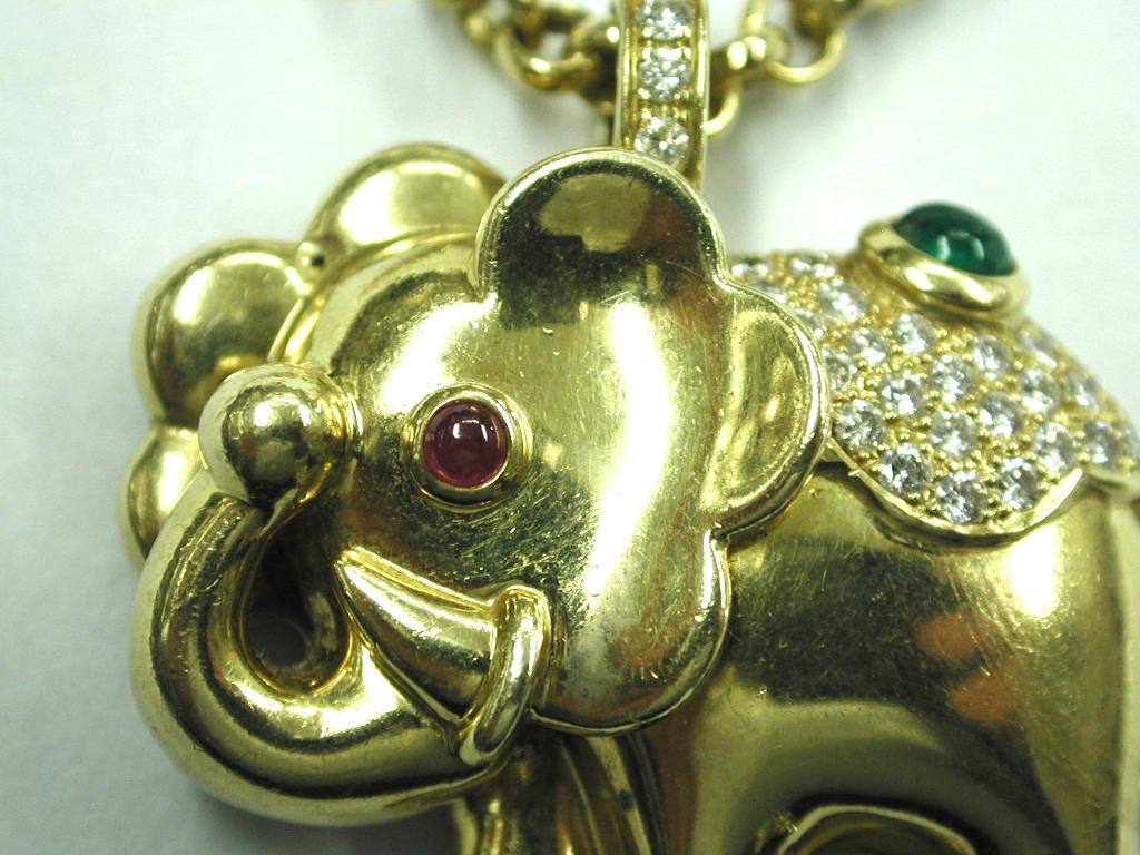 elephant locket gold