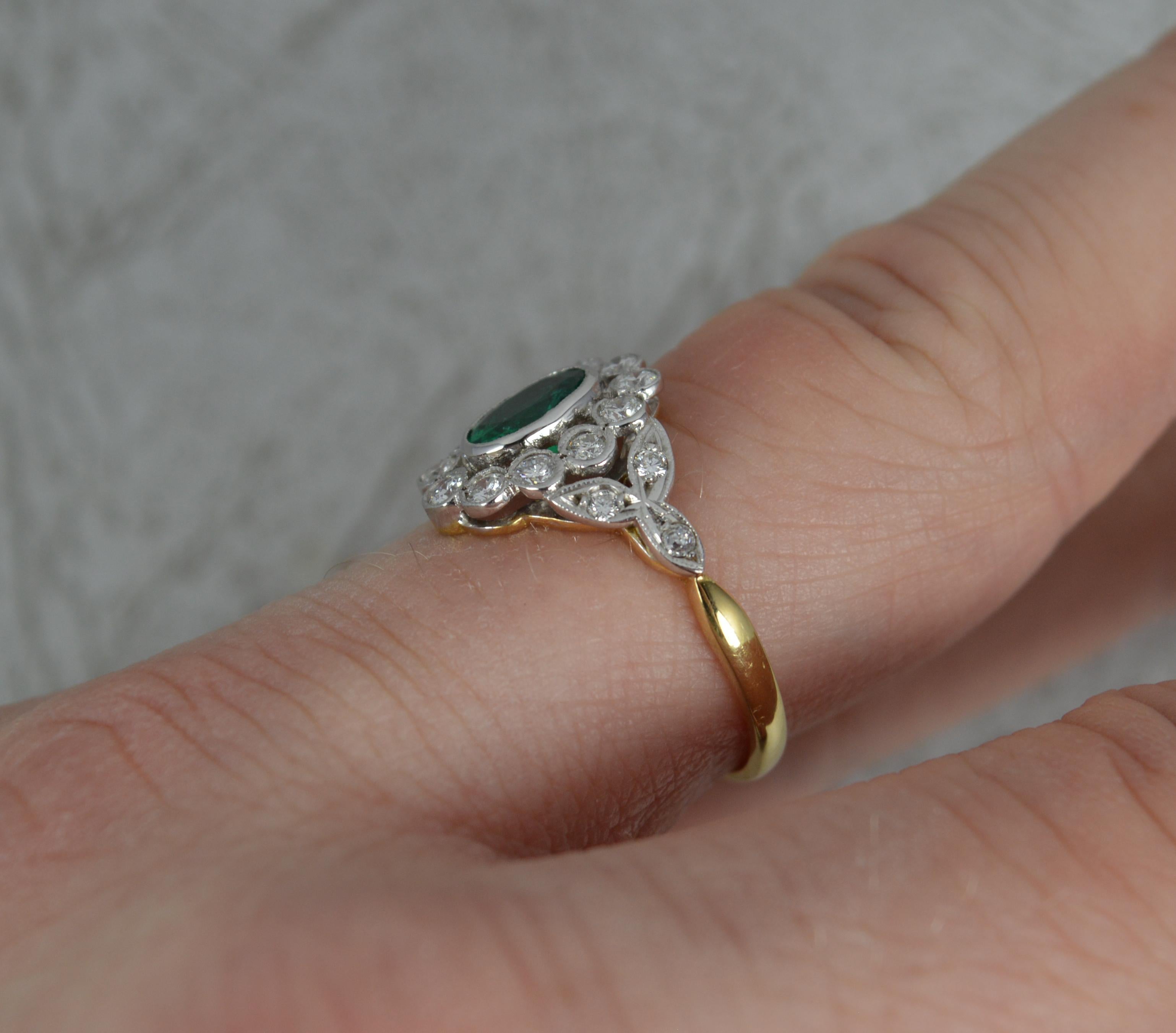 Oval Cut 18 Carat Gold Emerald and Vs Diamond Cluster Engagement Ring