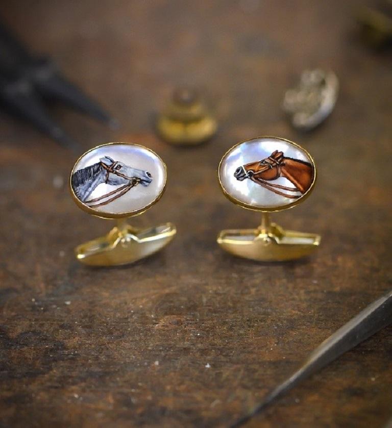 DEAKIN & FRANCIS, Piccadilly Arcade, London

Made from the finest 18ct yellow gold, these crystal cufflinks have been intricately hand-painted with two horse's heads. In contrasting grey and brown, the level of detail and accuracy is of the highest