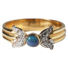 18ct Gold Lightning Ridge Australian Solid Black Opal & Diamond Bow Ring O / 7