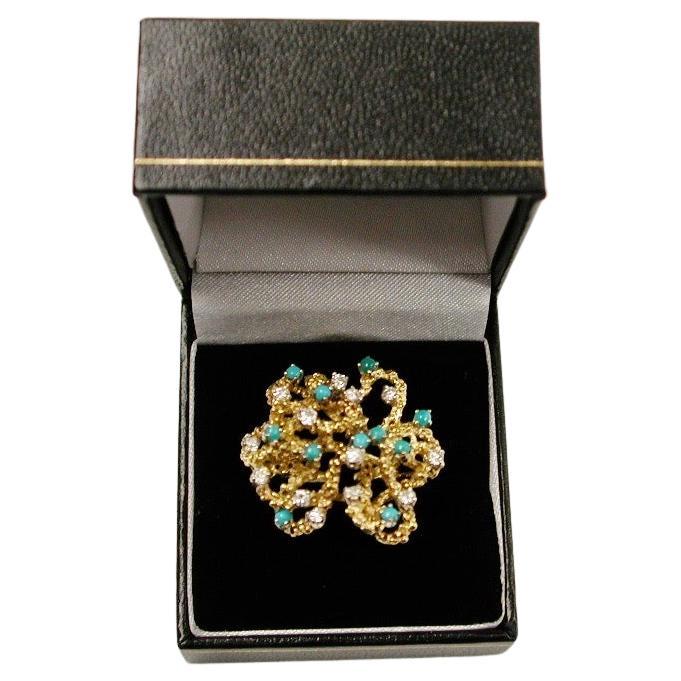 Anillo modernista de oro de 18 ct con turquesa y diamantes talla brillante circa 1960 en venta