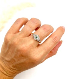 18ct Gold & Platinum, 1920s Emerald and Diamond Star Set Daisy Cluster Ring