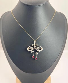 18ct Gold & Platinum, Edwardian Belle Epoque Diamond & Ruby Bow Shaped Pendent