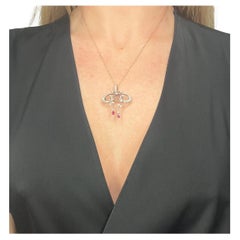 18ct Gold & Platinum, Edwardian Belle Epoque Diamond & Ruby Bow Shaped Pendent