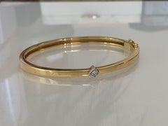 18ct Gold Princess 0.25 carat Diamond Bangle.