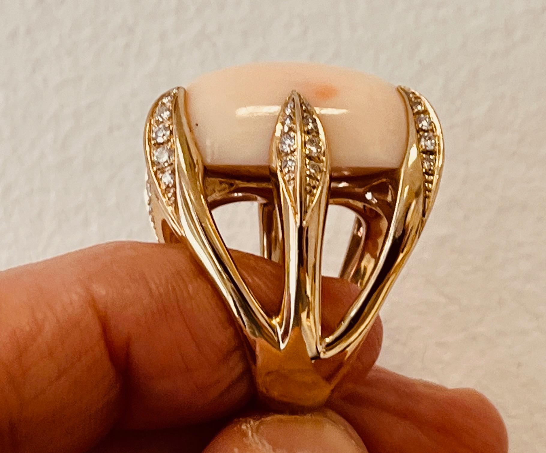18ct Gold Ring Set With An Angel Skin Coral Held By Six Heavy Diamond Set Claws For Sale 14