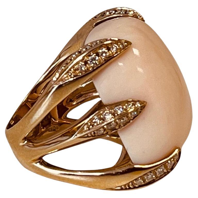 18ct Gold Ring Set With An Angel Skin Coral Held By Six Heavy Diamond Set Claws For Sale