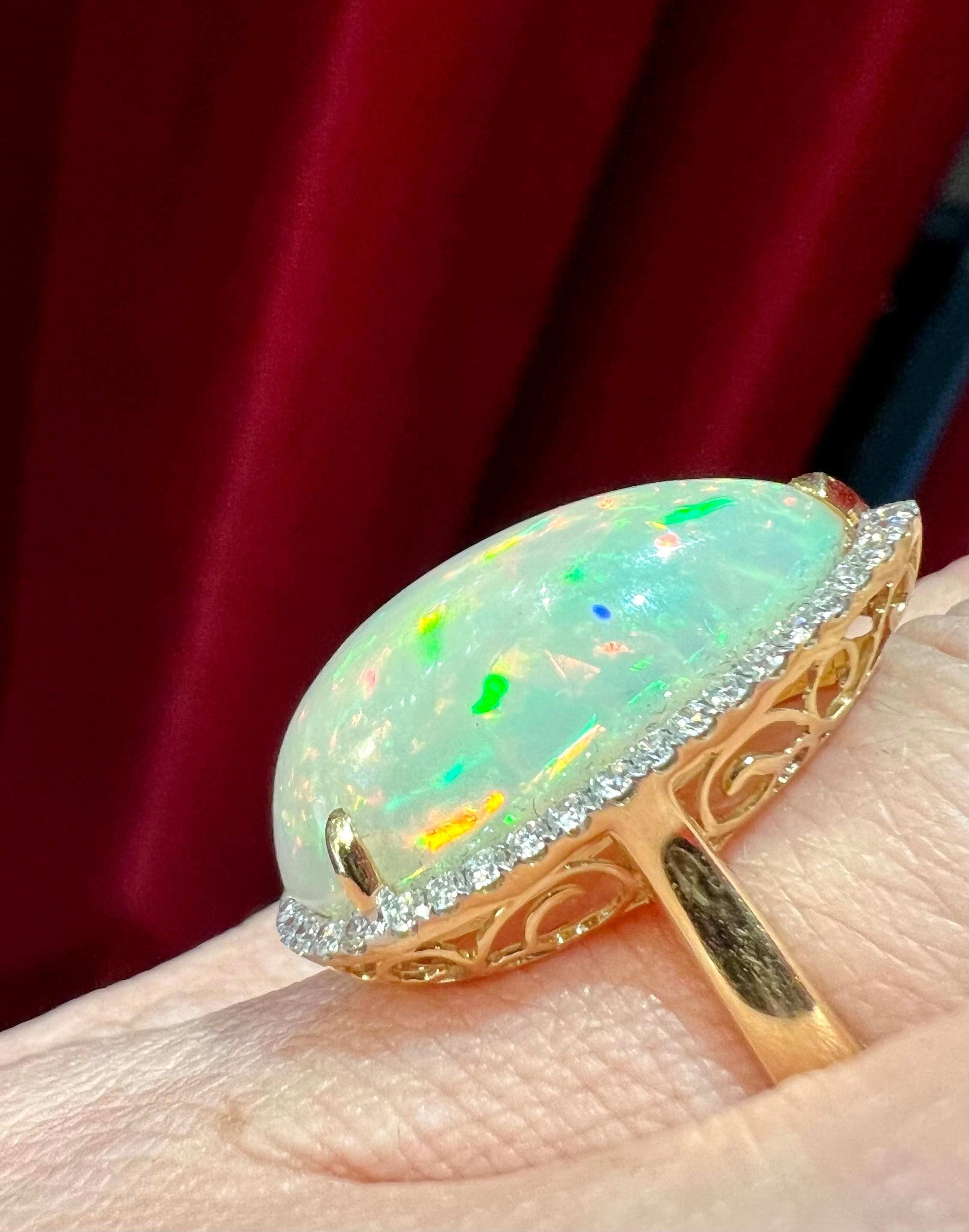Art Deco 18ct Gold Ring Set with an Opal Surrounded by Diamonds